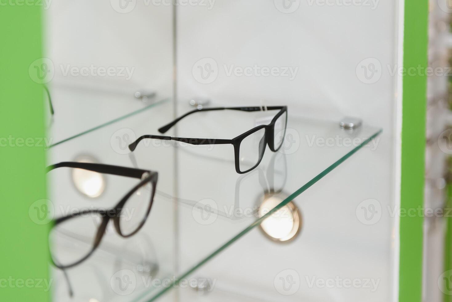 Row of luxury eyeglass at an opticians store. photo