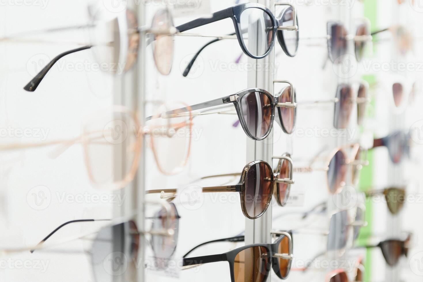 fashionable sunglasses on the shop shelf. photo
