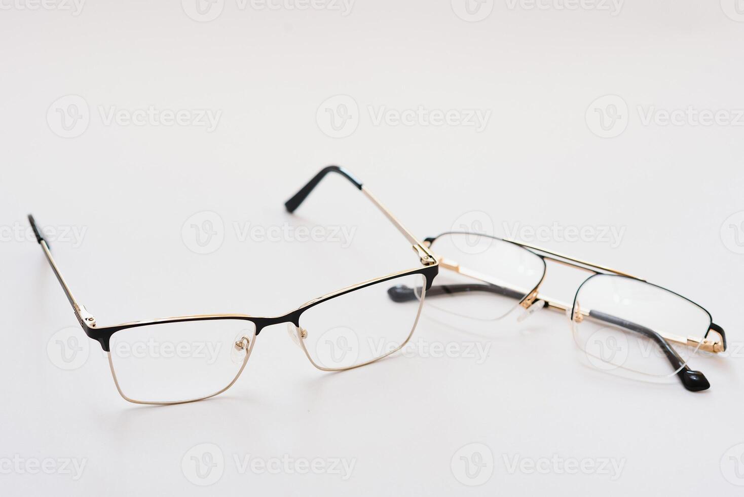 Black eyeglasses with white background photo