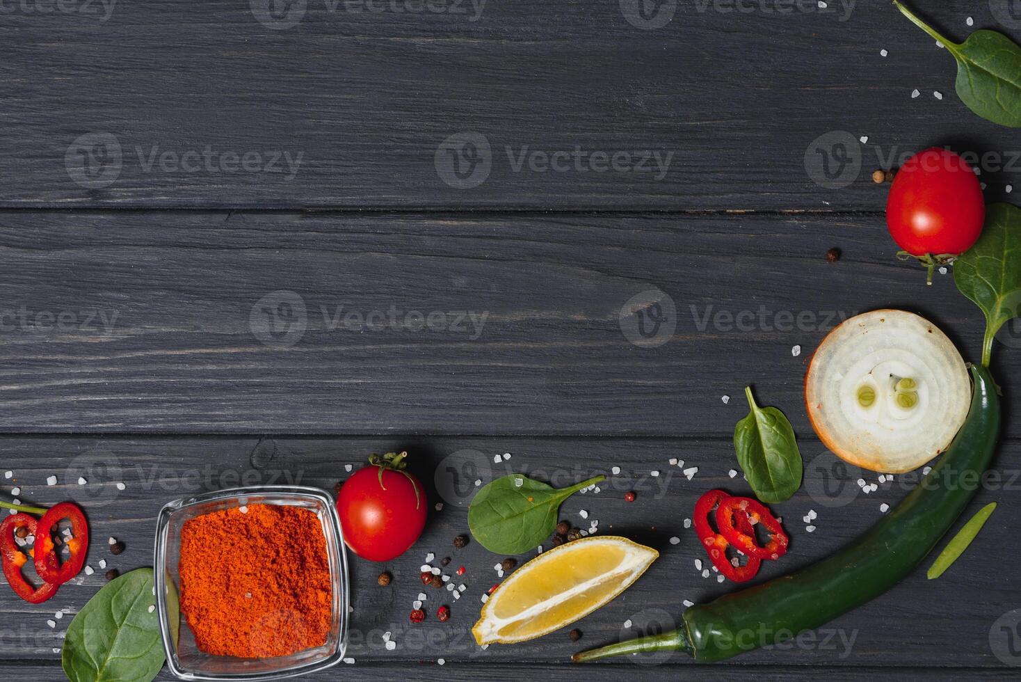 Cooking table. Background with spices and vegetables. Top view. Free space for your text. photo