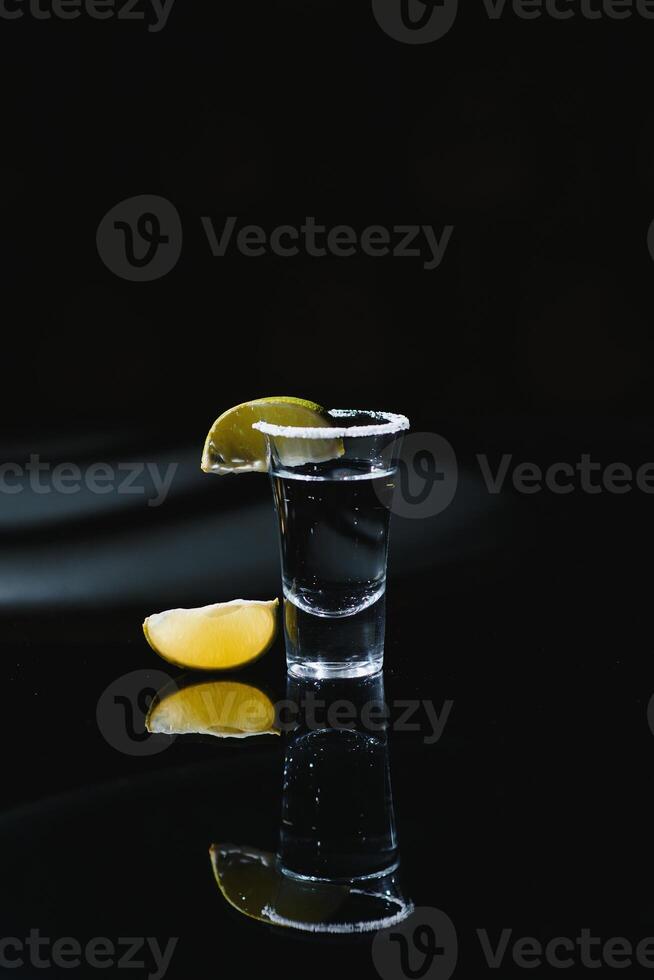 Tequila shot with lime . Selective focus photo