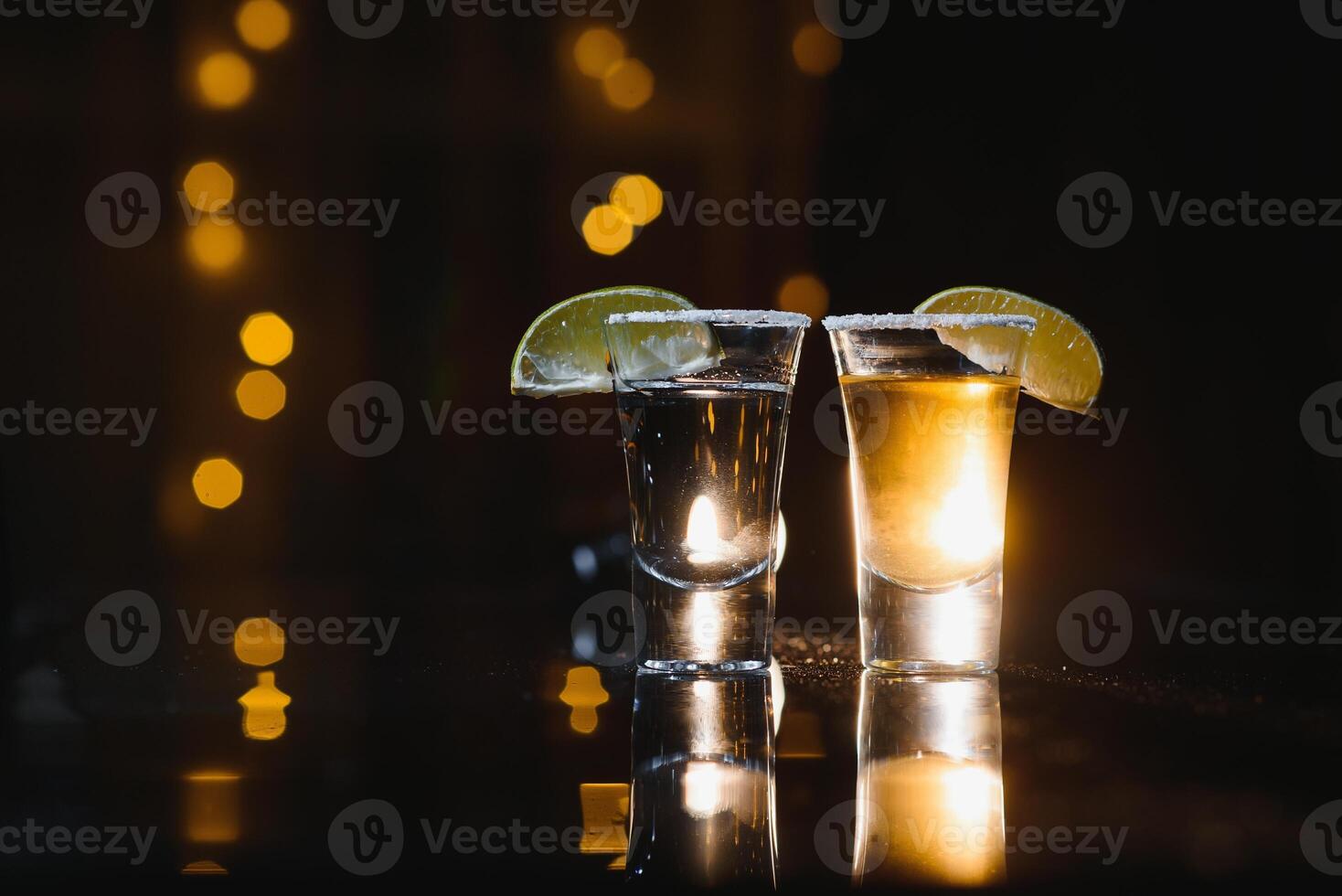 Tequila shot with lime . Selective focus photo