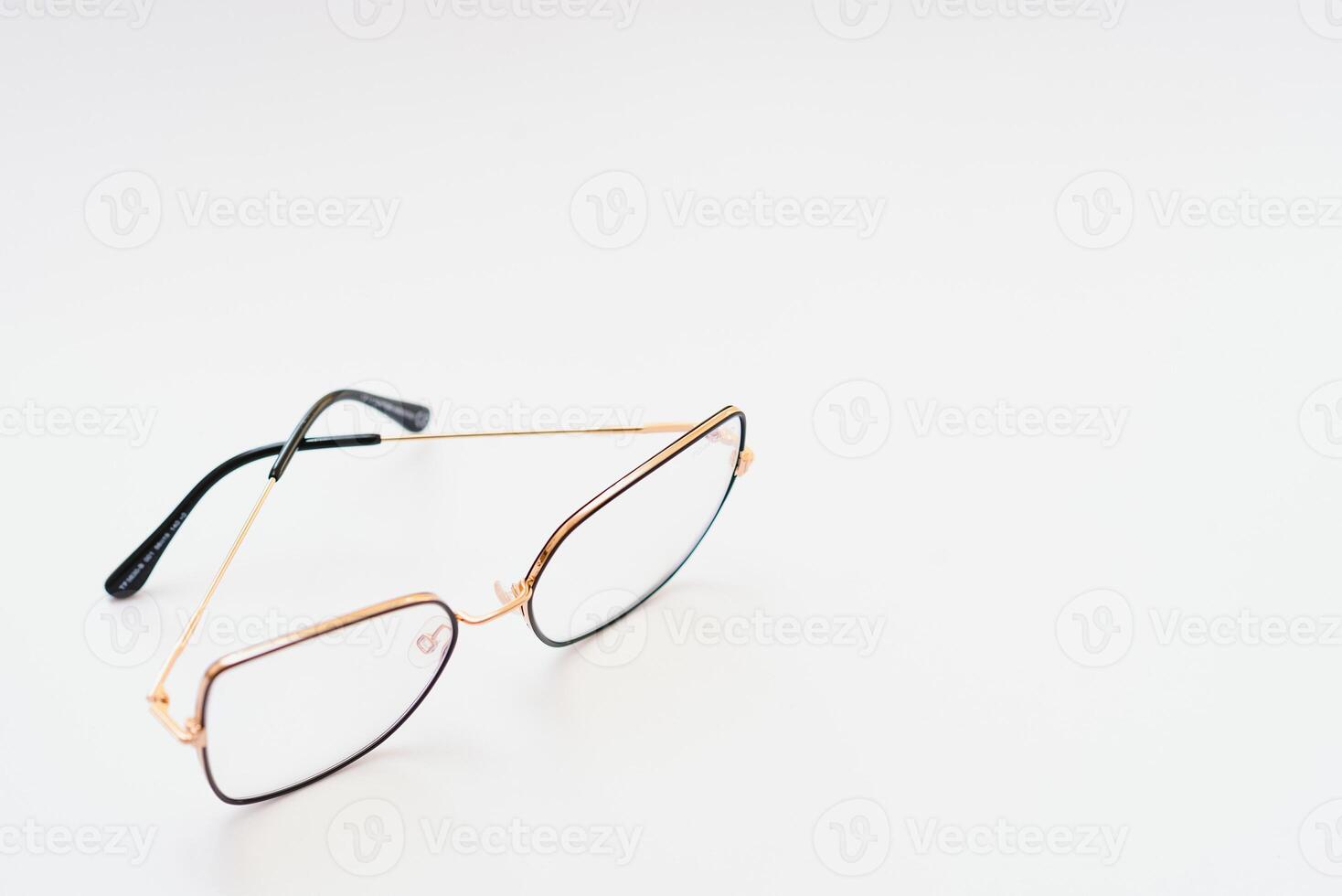 isolation glasses on white background. black and white combination oval eyeglass frames. oval eye glasses frame in the photo from above on a white background
