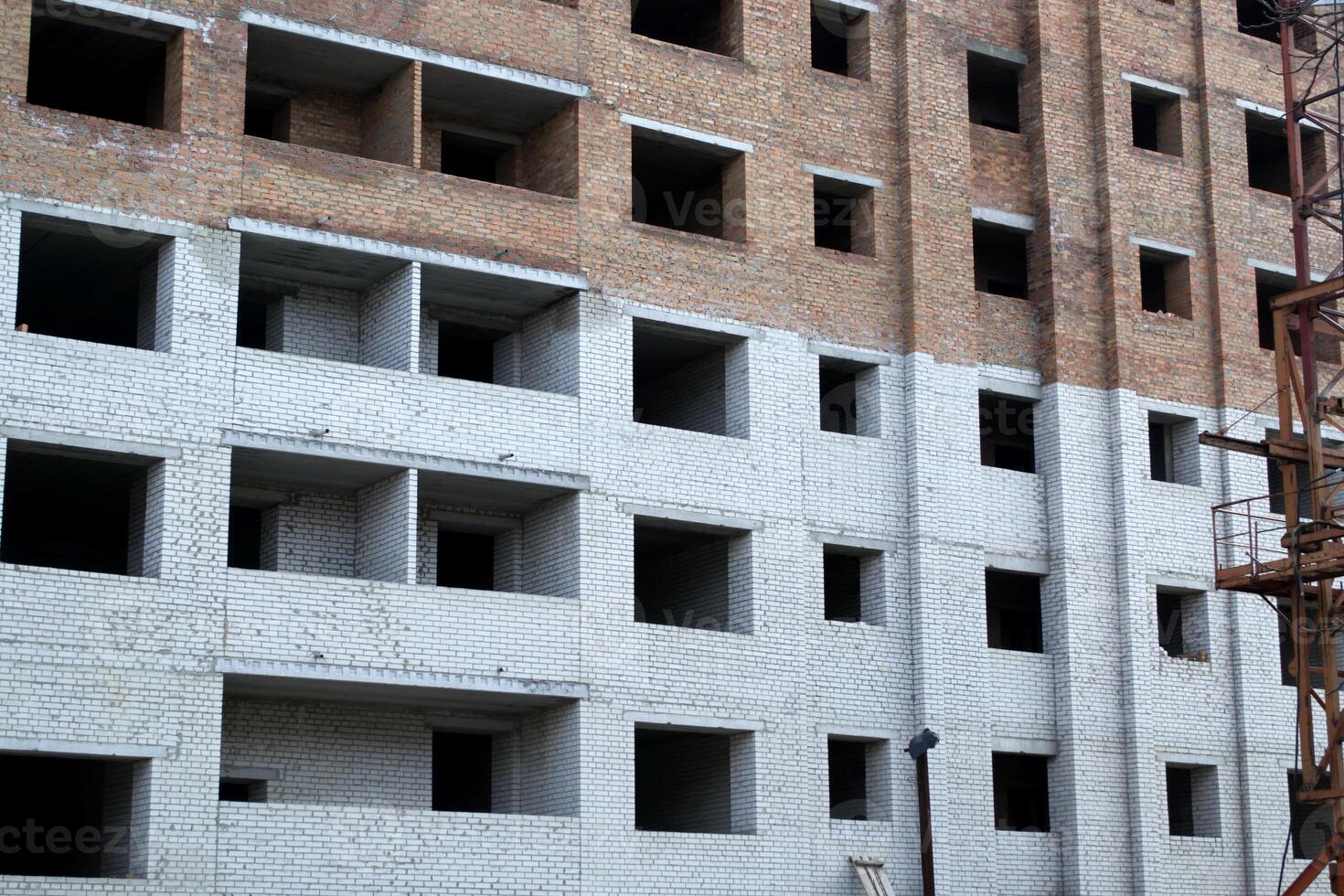 construcción de un multi piso residencial edificio. construcción trabajos foto