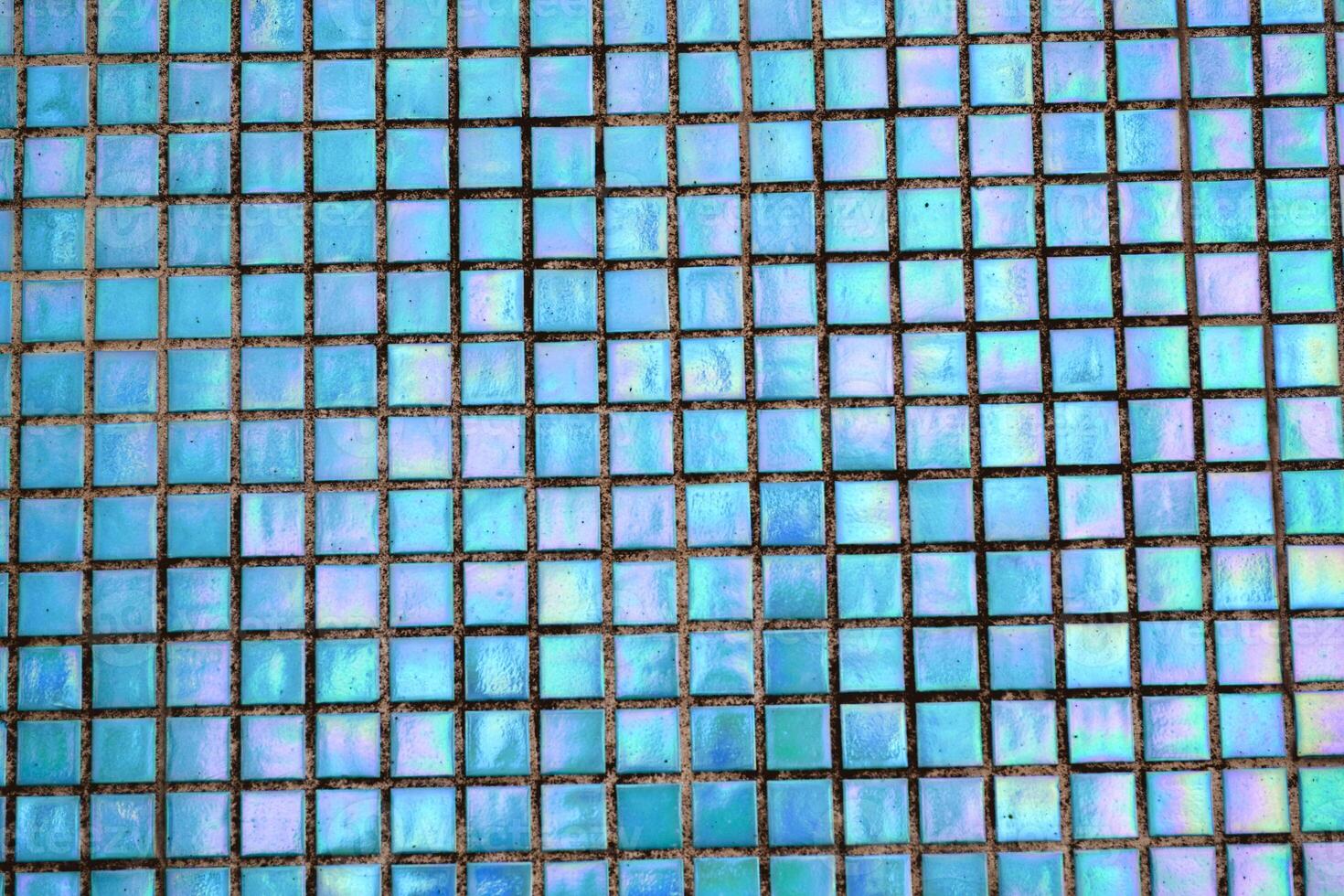 Bright blue mosaic background. Holografic texture. photo