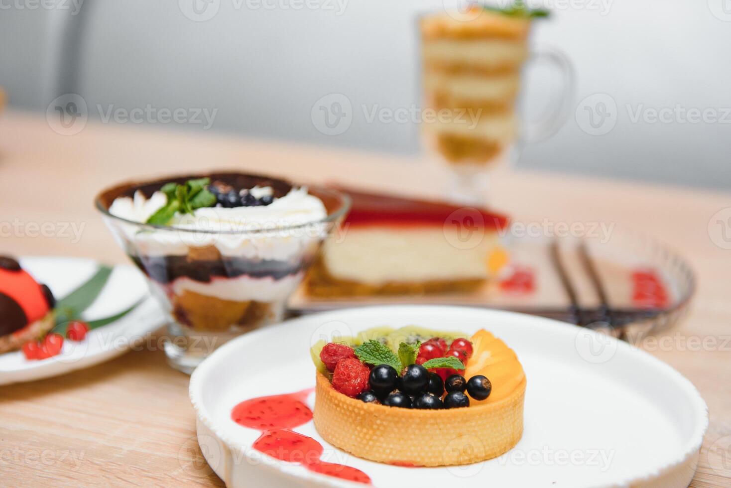 different desserts on the table in a cafe photo