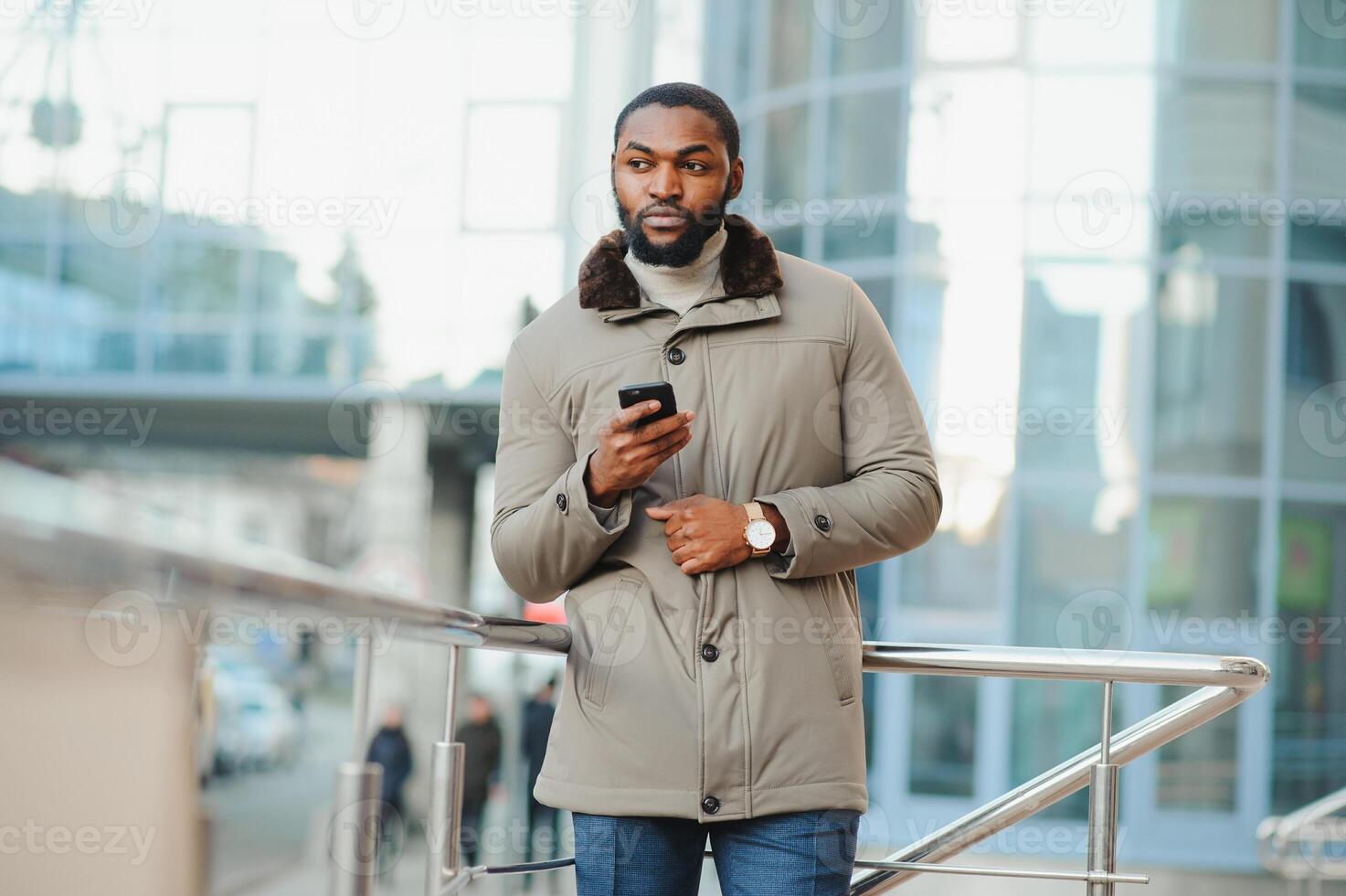 African American man in stylish new clothes on the street photo