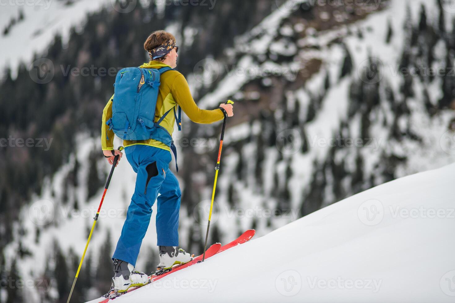 Solo ski mountaineering climb photo