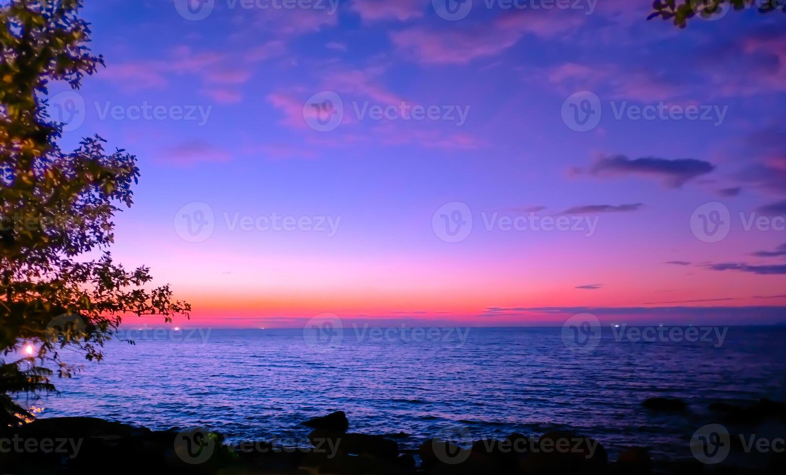 Sunset against blue sky.Beautiful tropical beach photo