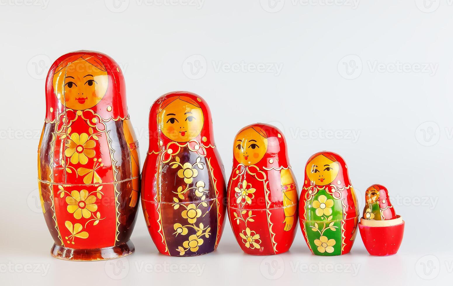 Matryoshka, a Russian wooden doll on a white background photo