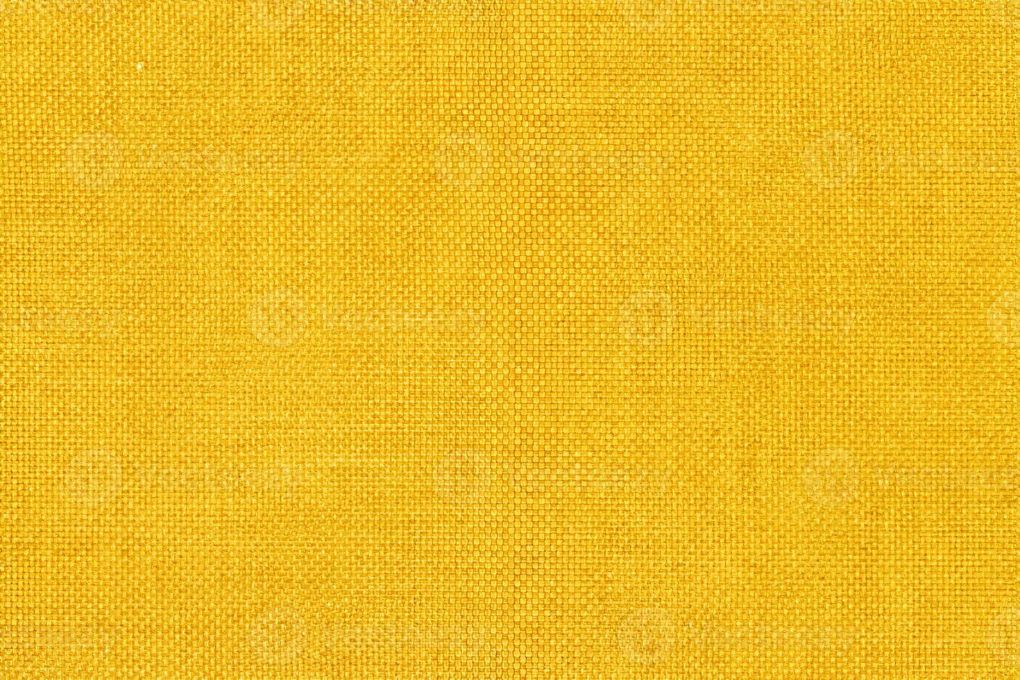 Yellow fabric cloth texture background, seamless pattern of natural textile. photo