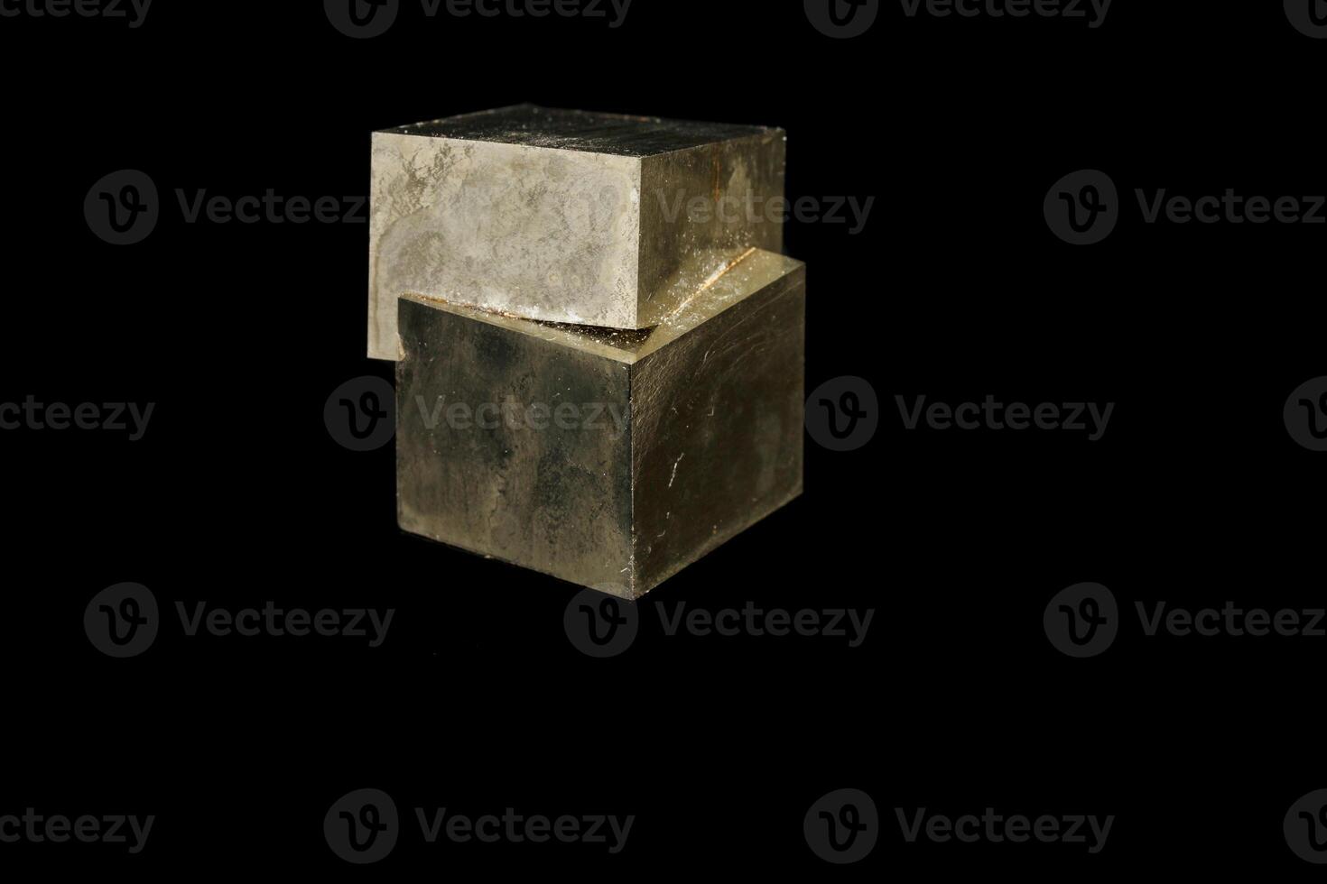 Macro mineral stone Pyrite on a black background photo