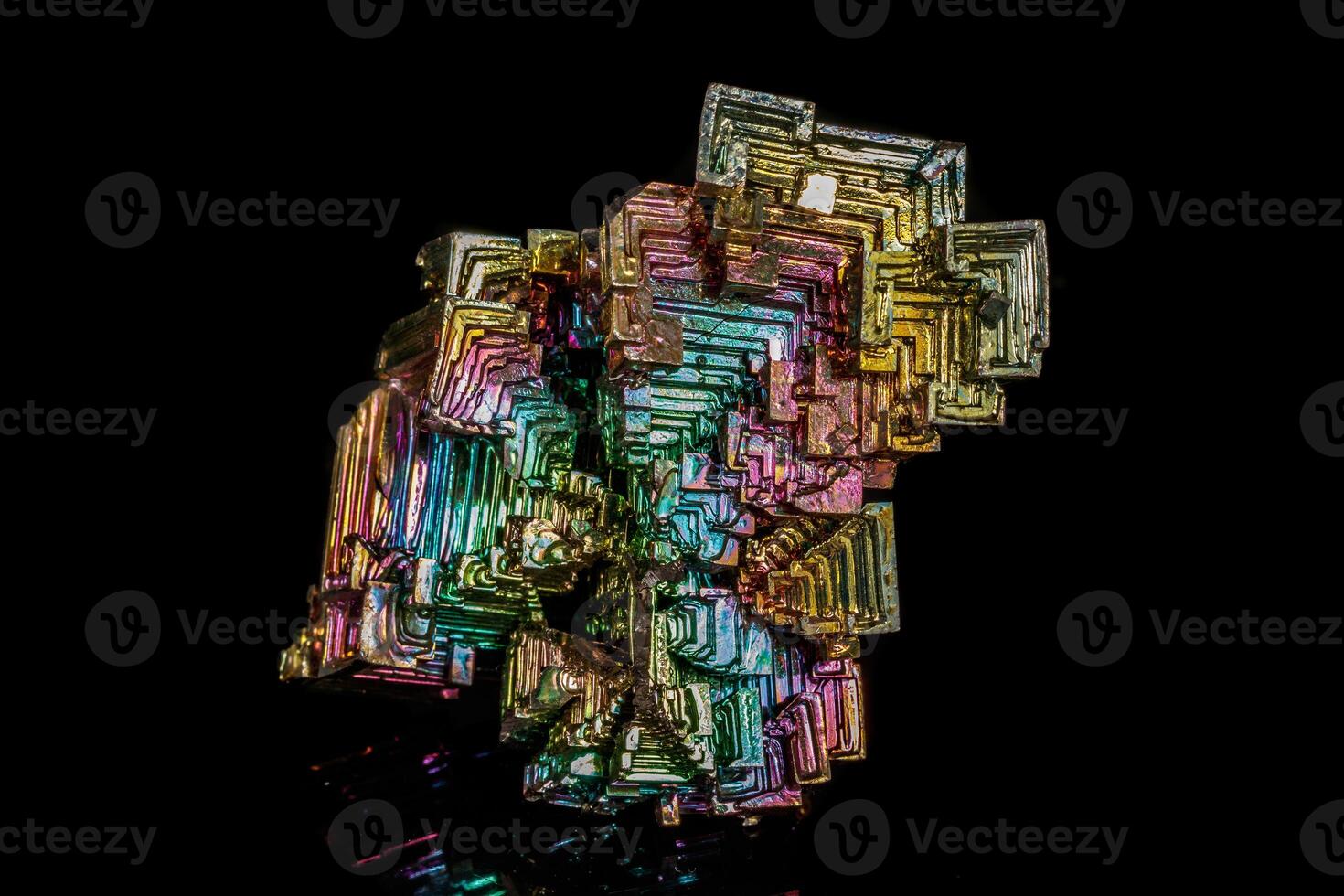 Macro of the stone bismuth mineral on a black background photo
