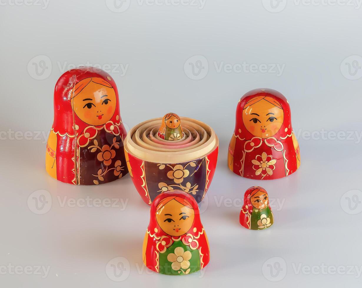 Matryoshka, a Russian wooden doll on a white background photo