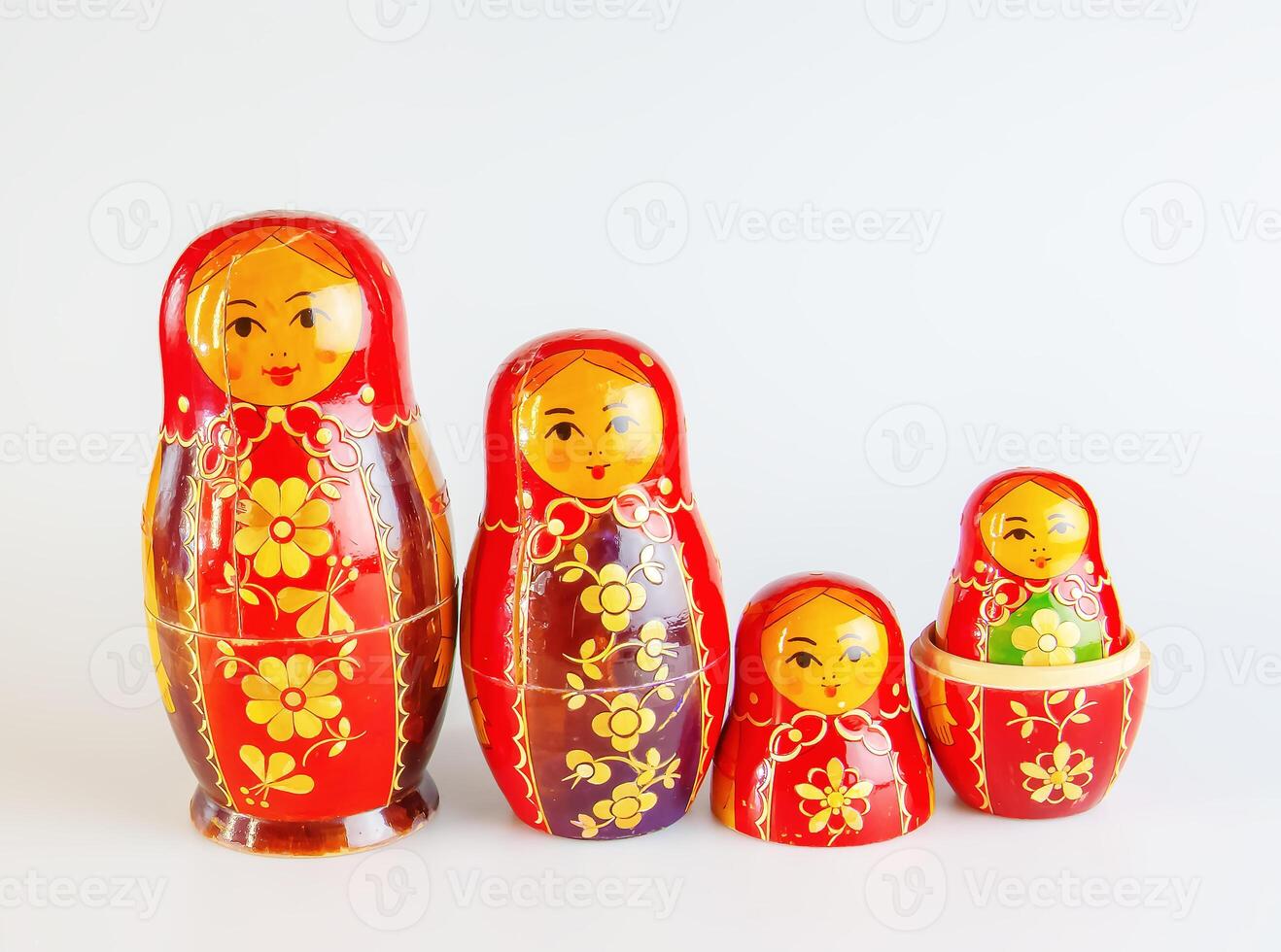 Matryoshka, a Russian wooden doll on a white background photo