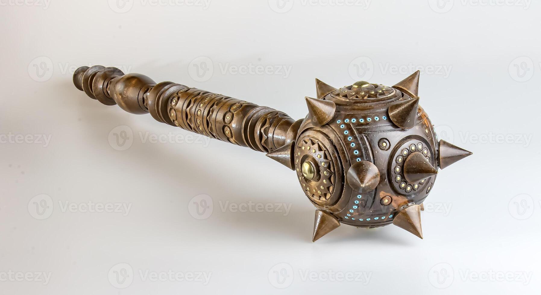 Souvenir wooden Hetman's Mace on a stand on a white background. Ukraine. photo