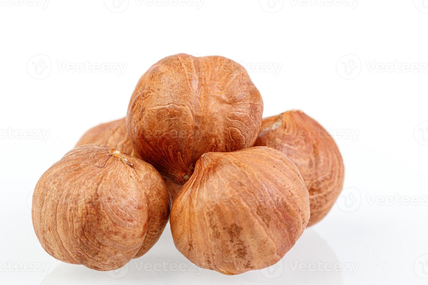 macro hazelnuts nuts on a white background photo