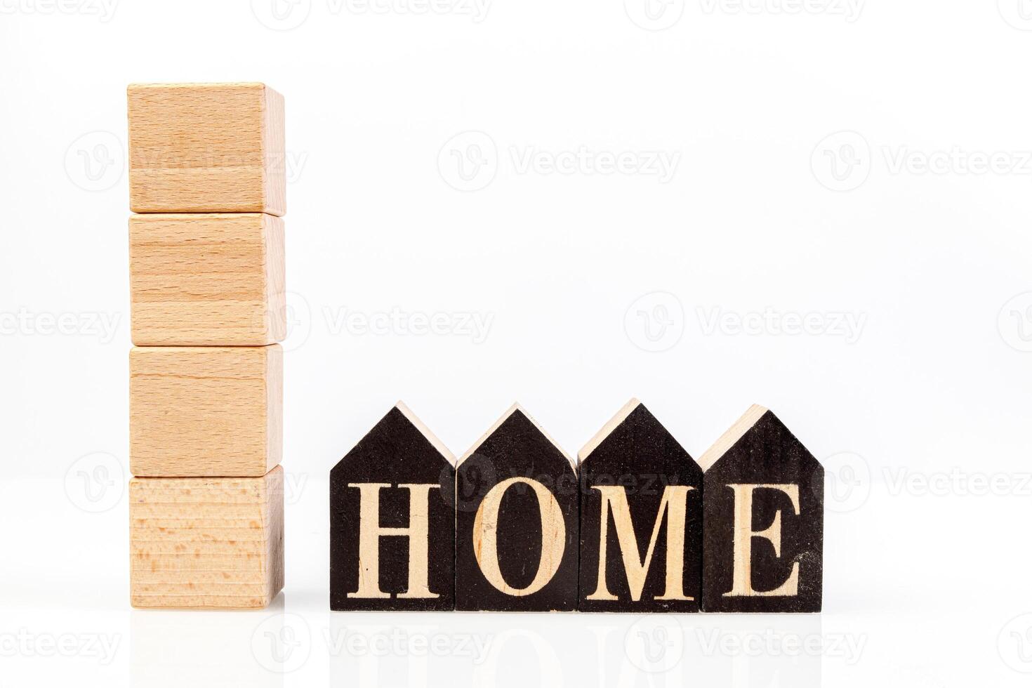 Wooden cubes Home on a white background photo