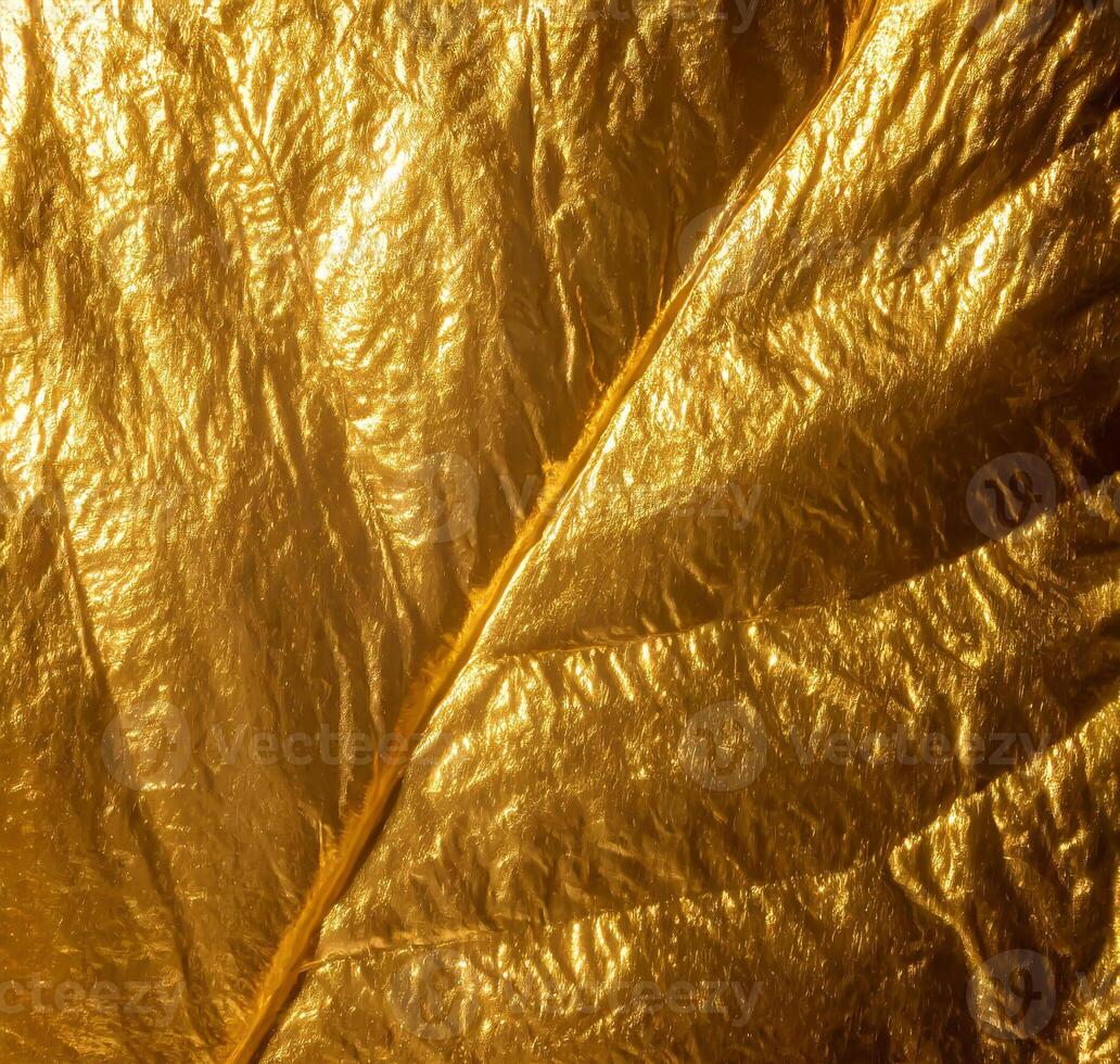 AI generated Shiny yellow leaf gold foil texture photo