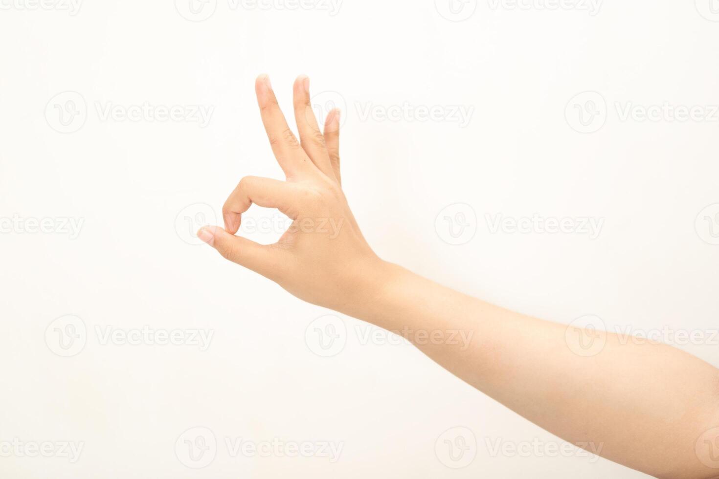 Hand pointing at something and make a sign on white background photo