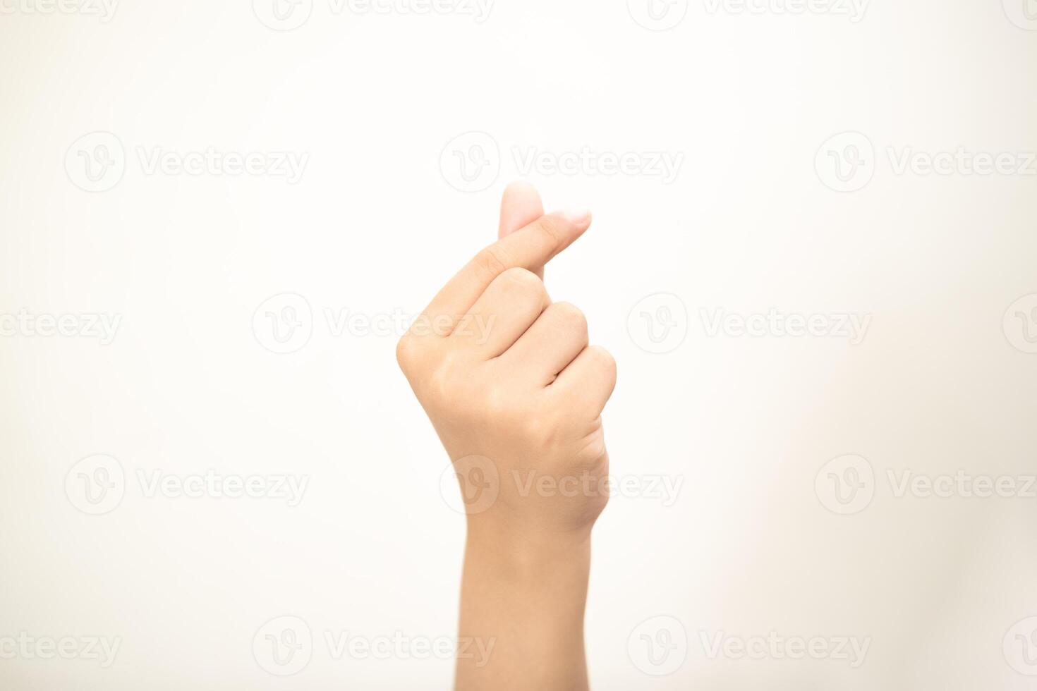 Hand pointing at something and make a sign on white background photo