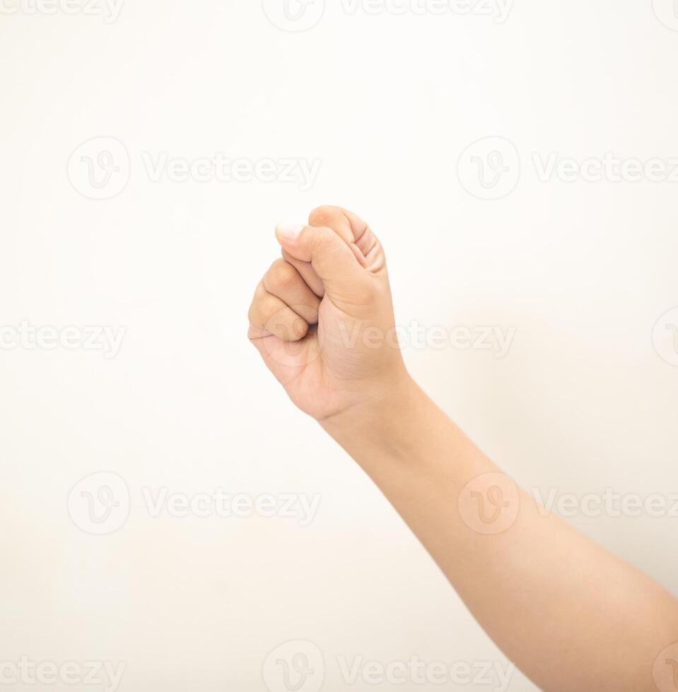 Hand pointing at something and make a sign on white background photo