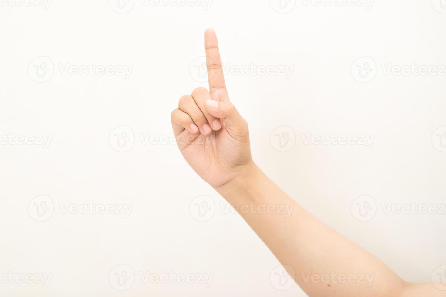 Hand pointing at something and make a sign on white background photo