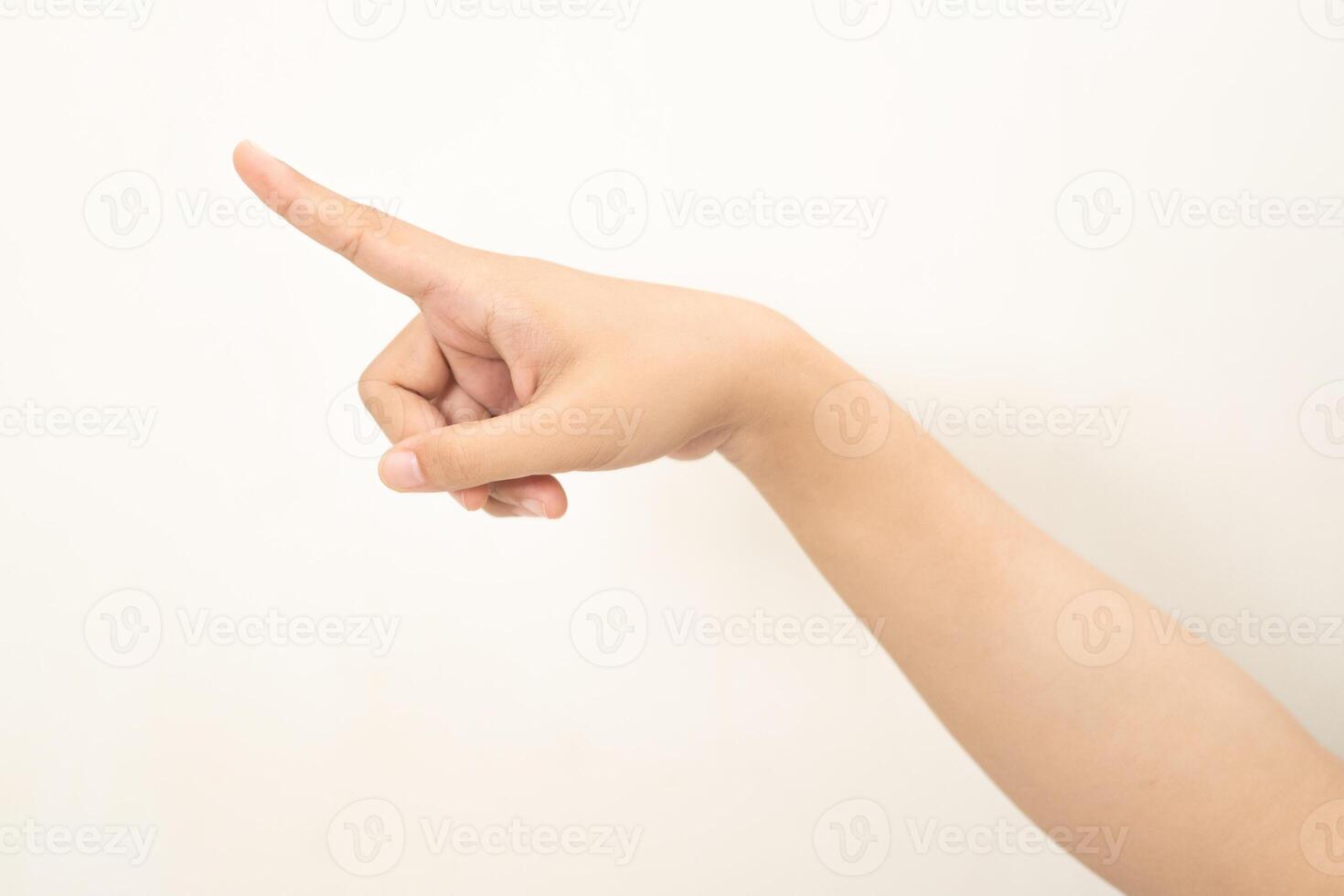 Hand pointing at something on white background photo