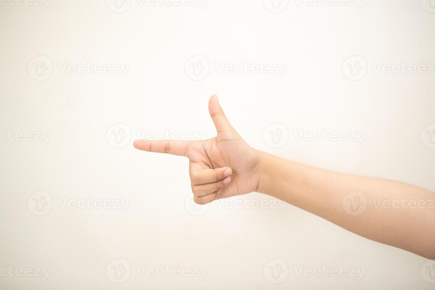 Hand pointing at something on white background photo
