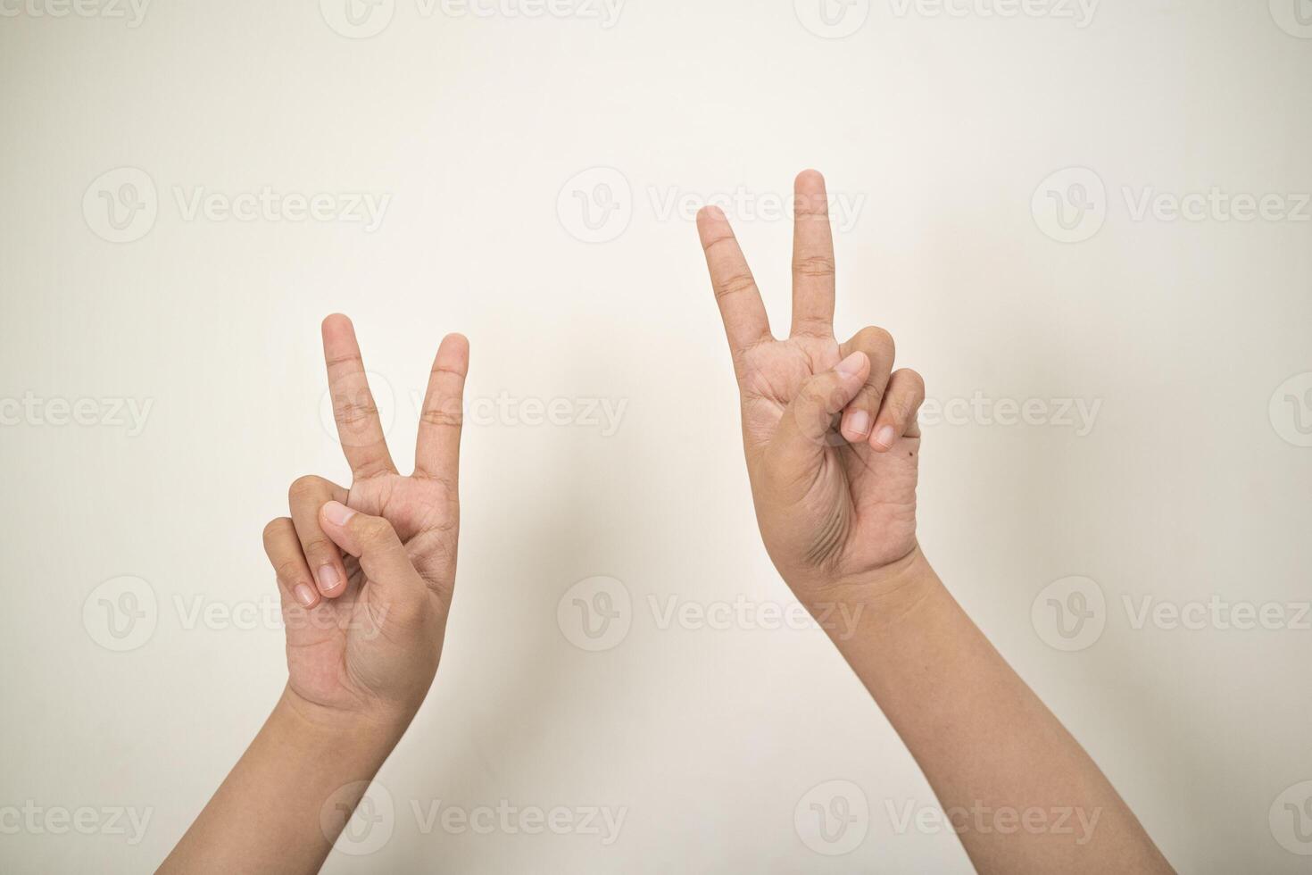 Hand pointing at something and make a sign on white background photo