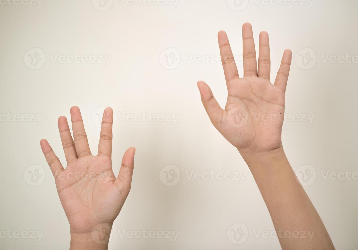 Hand pointing at something and make a sign on white background photo