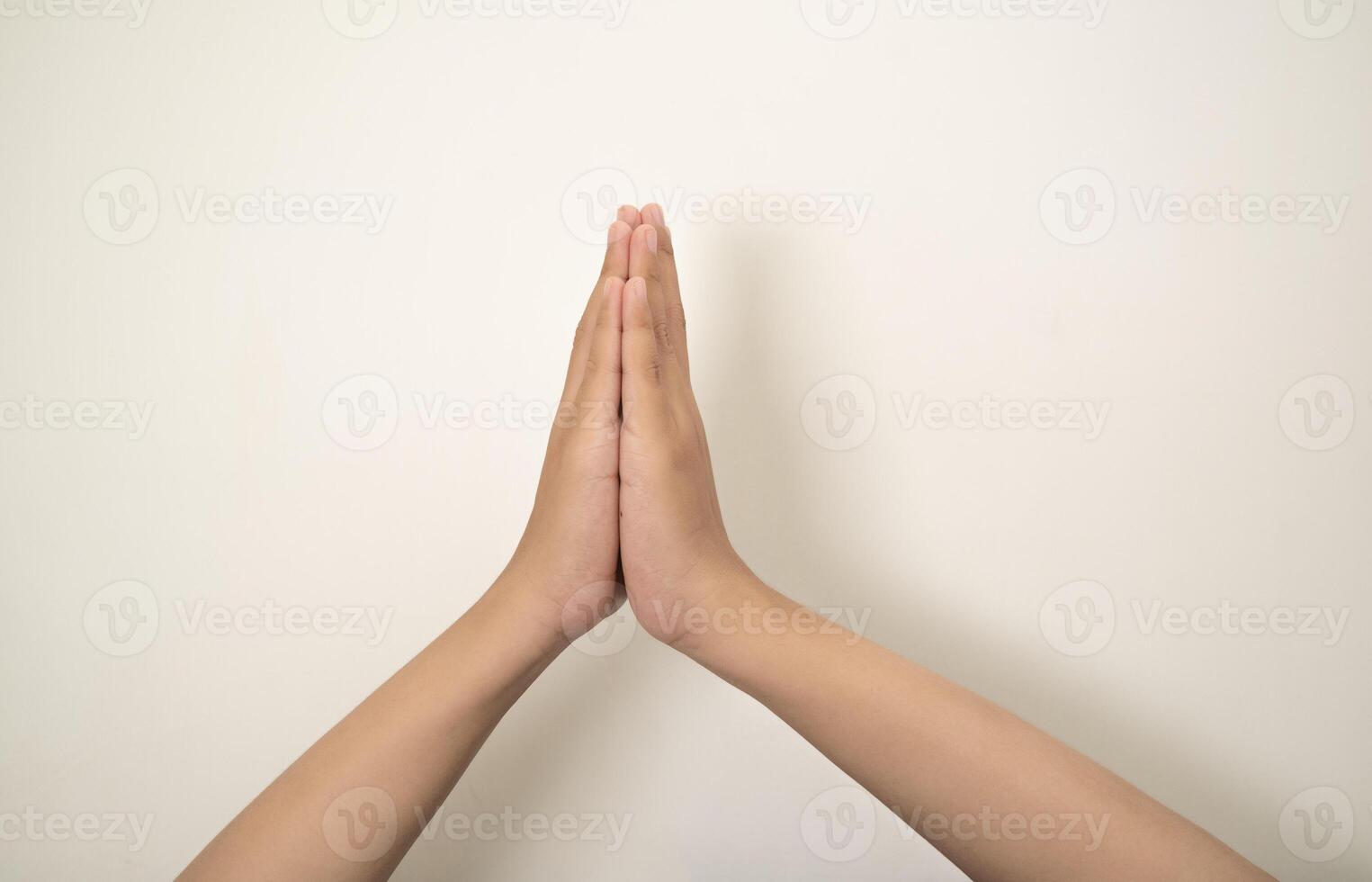 Hand pointing at something and make a sign on white background photo
