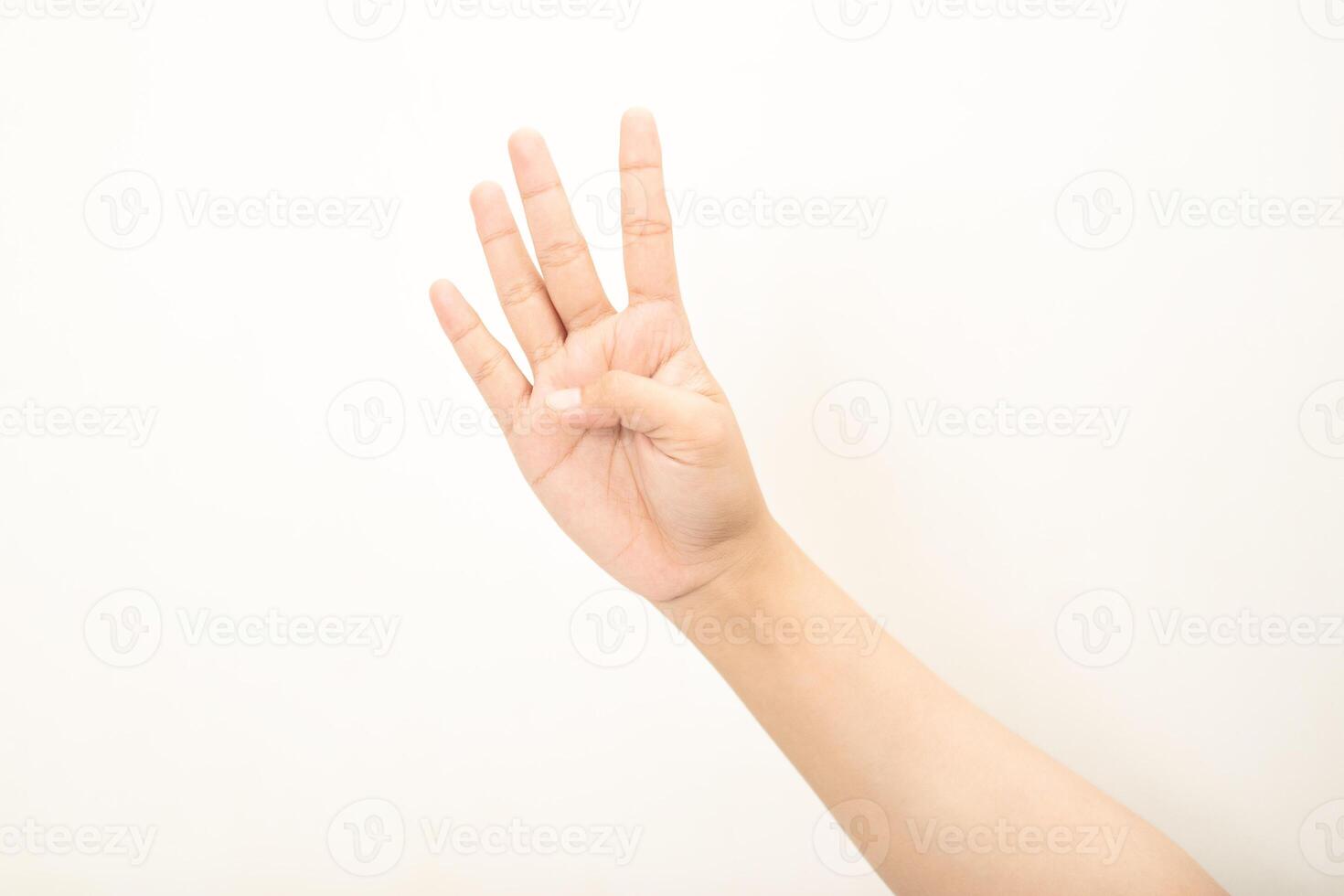 Hand pointing at something and make a sign on white background photo