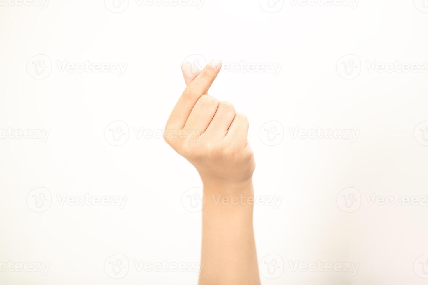 Hand pointing at something and make a sign on white background photo