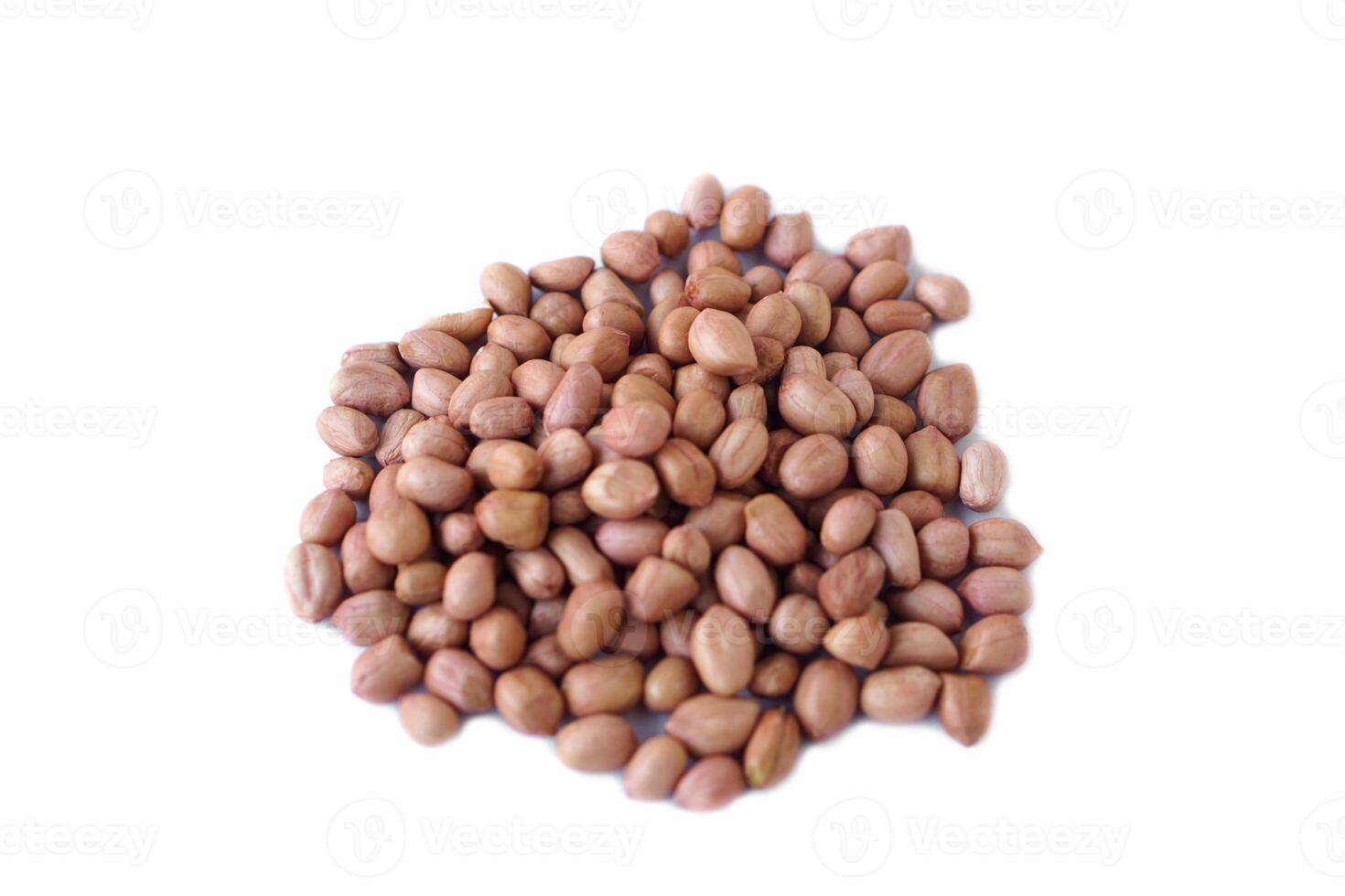 Pile of peeled off peanut seeds isolated on white background. Concept, healthy food, grains with good for health, can be cooked as ingredient in various food menu or snack. photo