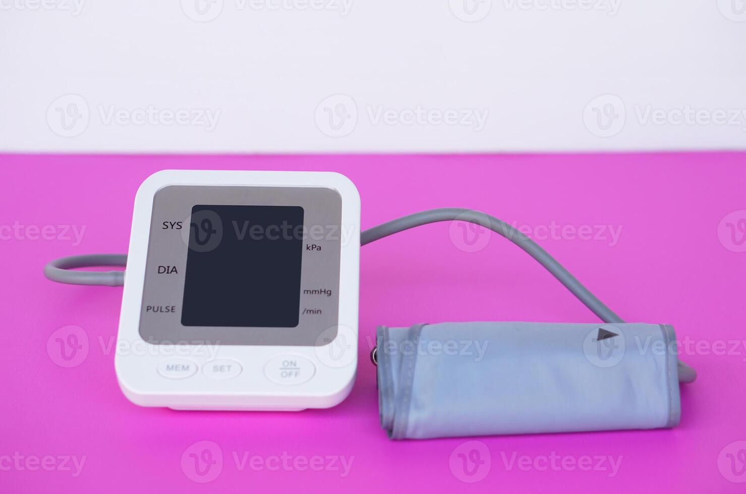 Automatic blood pressure monitor machine. concept. Healthcare equipment, portable, can use at home for self check up. Digital measurement device, easy to use. photo