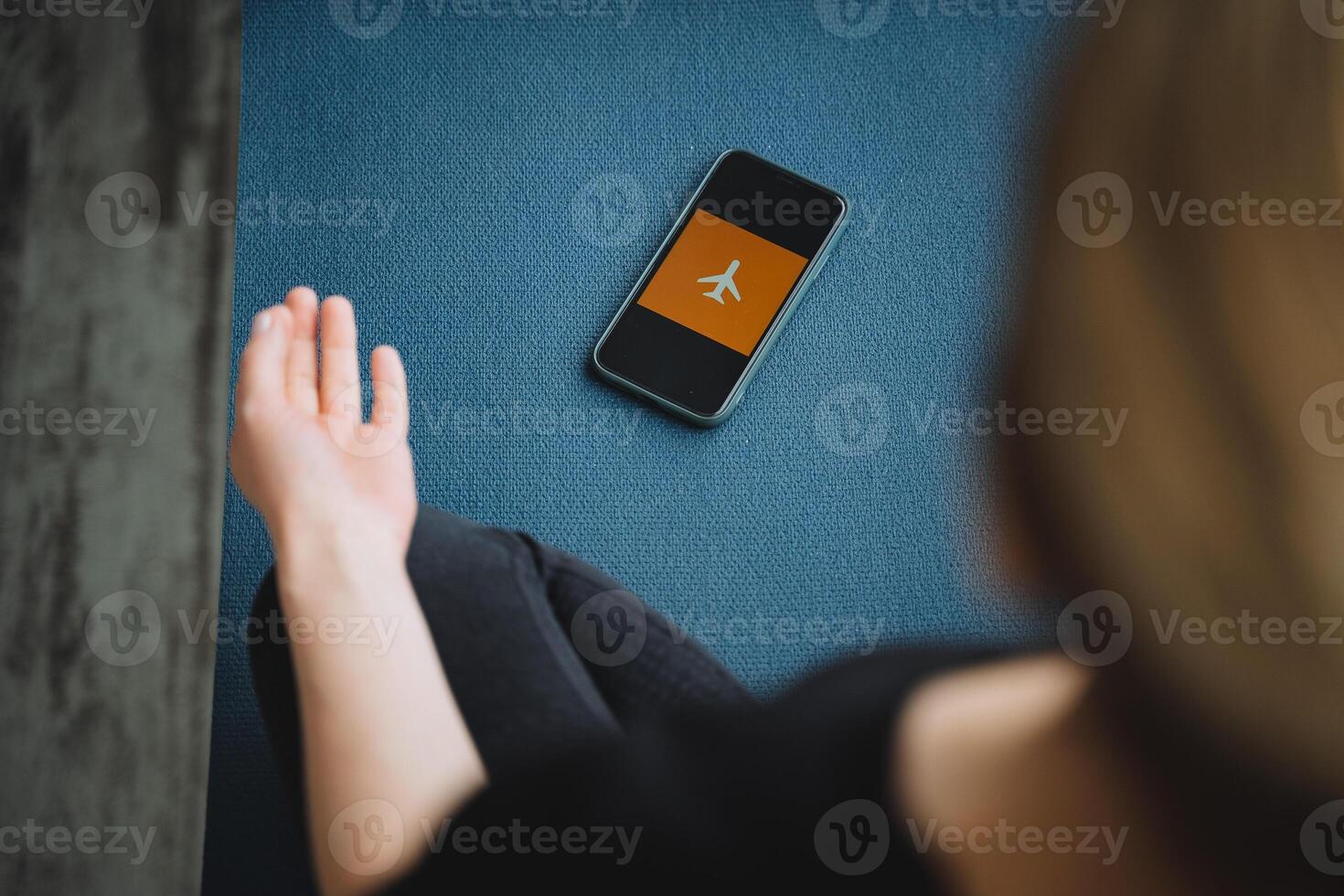 Practice yoga in silence the phone is turned off in airplane mode. Do not disturb during meditation. Tranquility privacy time for yourself to take care of your health. photo