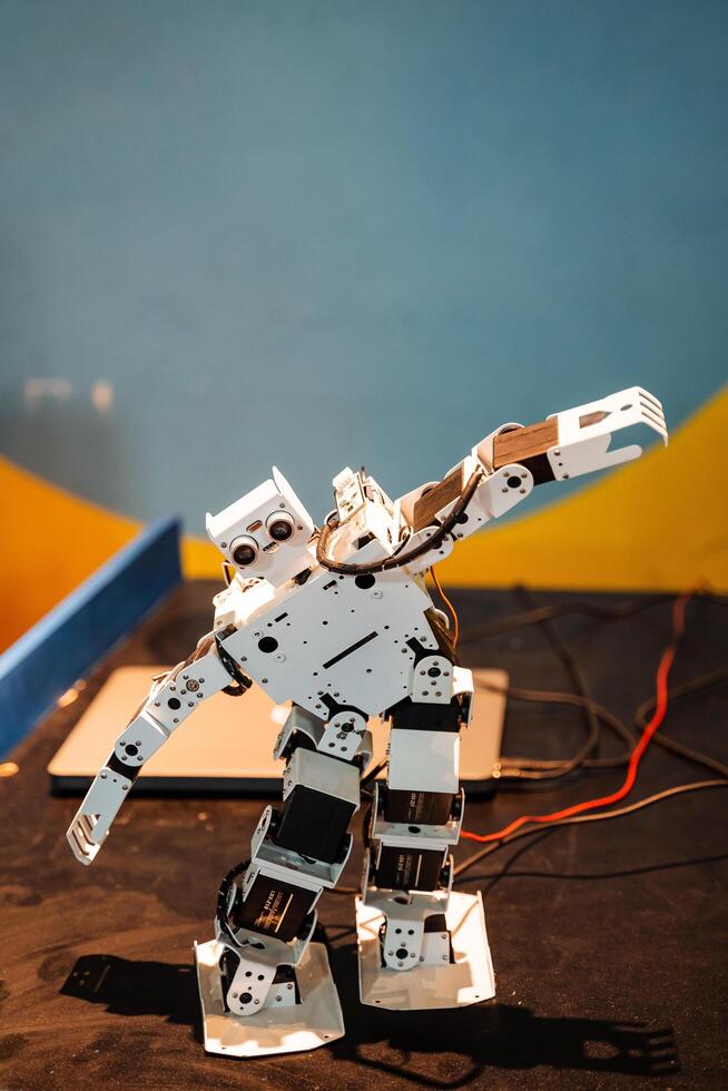 The robot is mechanically mobile. Dancing roboticist. Exhibition of robots. Artificial intelligence. photo