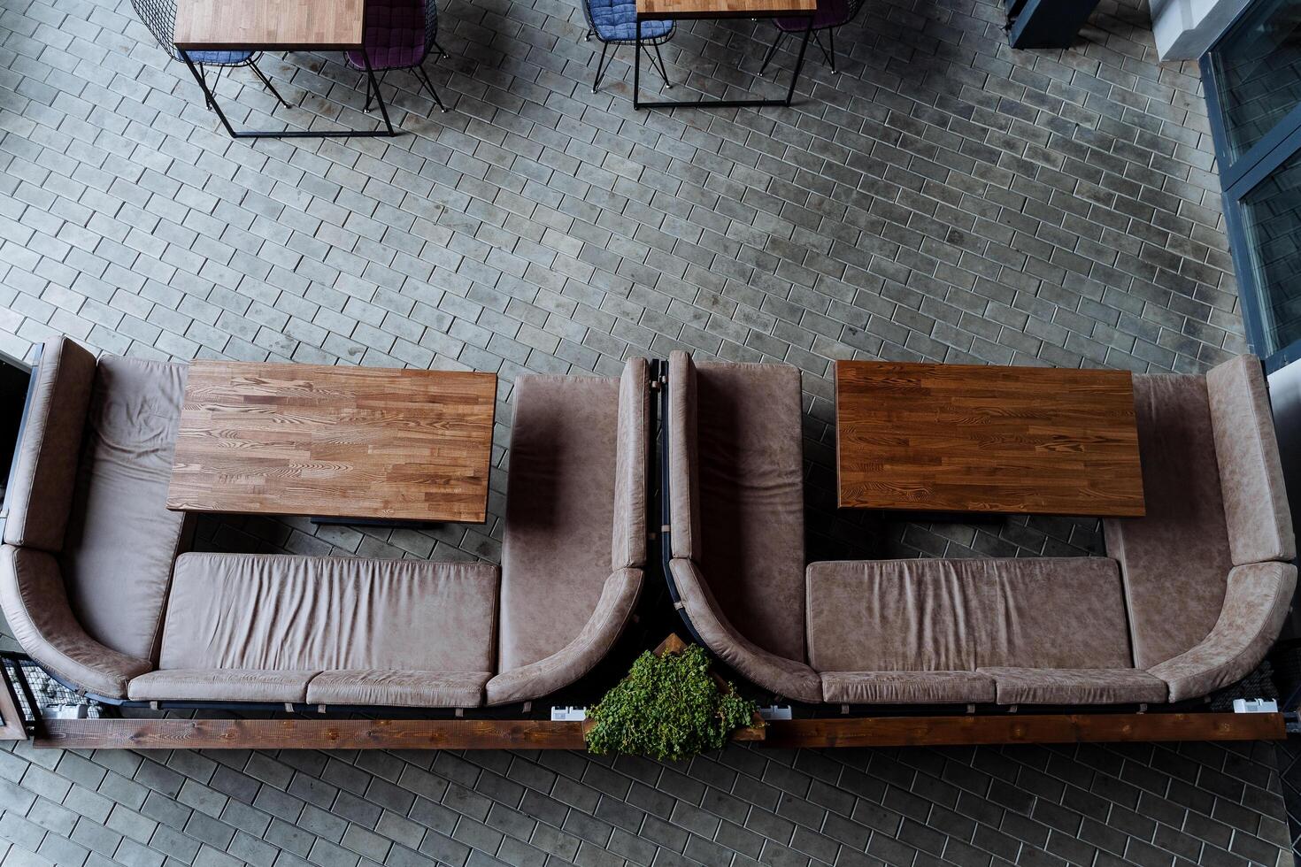 Lounge area on the street, summer cafe with sofas, catering with soft armchairs, food outside, empty table, no people, order food to take away. photo