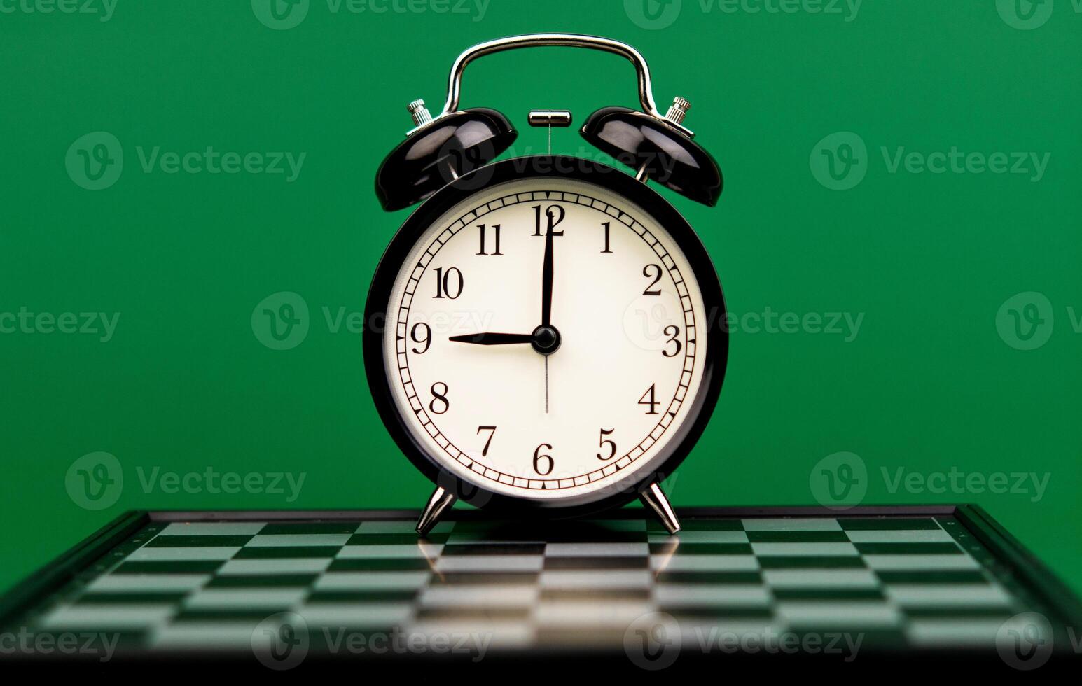 Alarm clock. High quality studio photography, time concept and working with time. photo