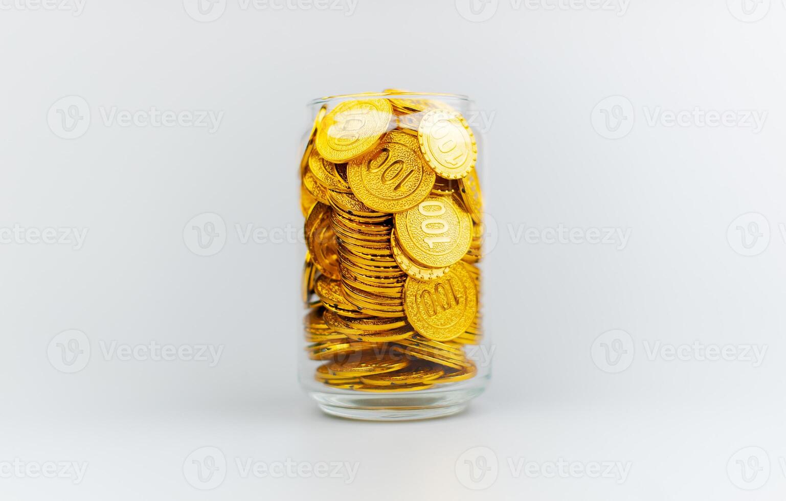 Saving gold coins in a glass jar, savings concept, financial planning and investment Cash flow and income photo