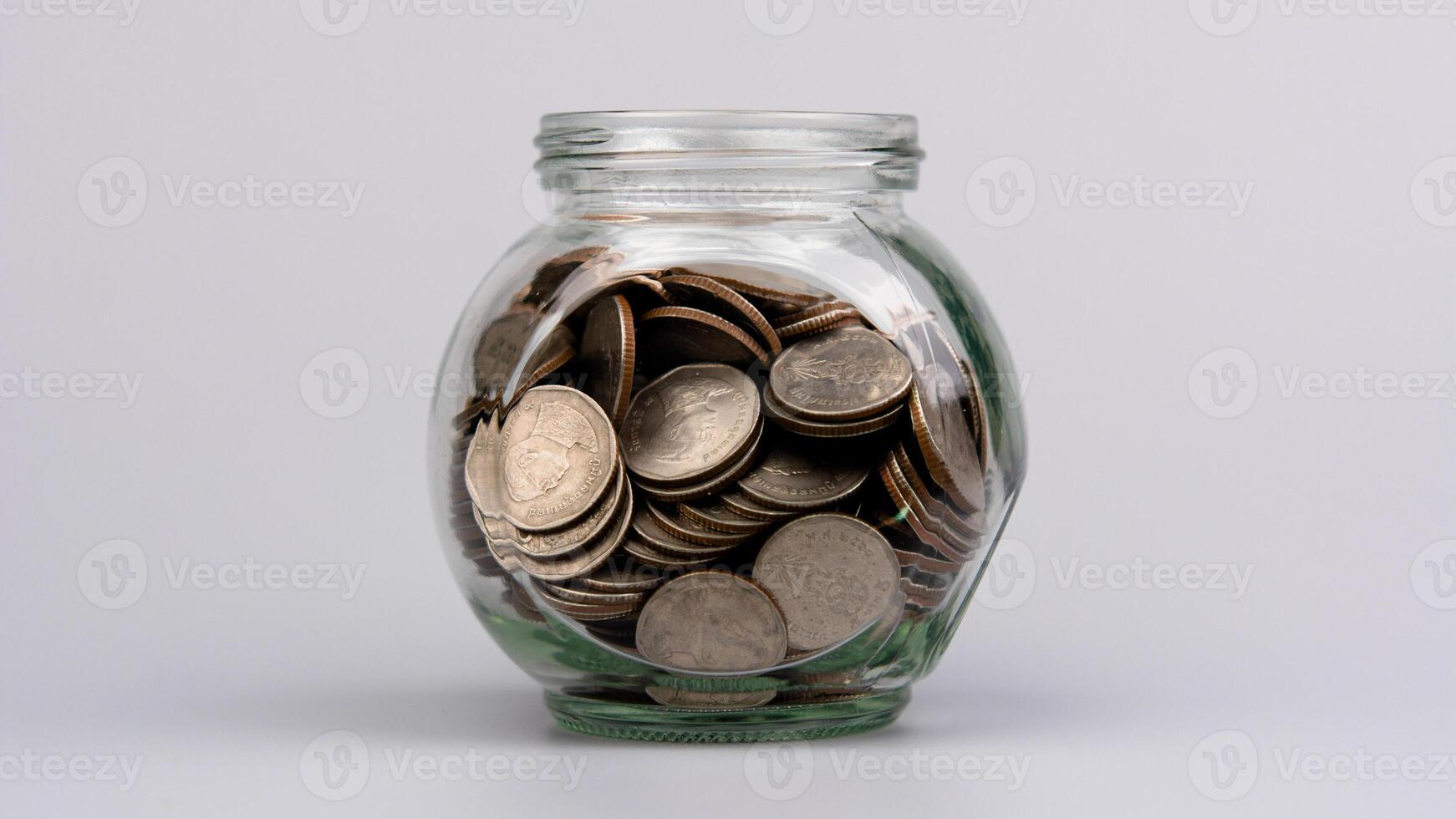 Saving coins in a glass jar, savings concept, financial planning and investment Cash flow and income photo