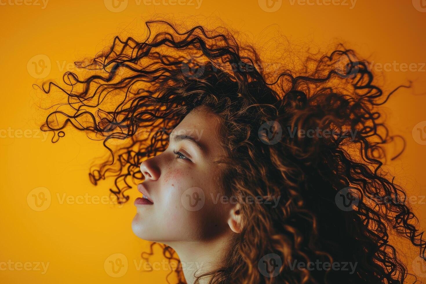 AI generated Curlyhaired girl waves in vibrant yellow background. photo