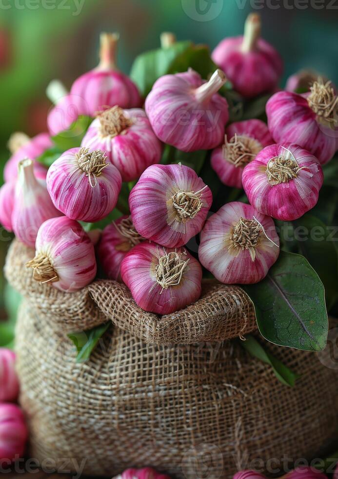 AI generated Fresh garlic in sack on wooden table photo