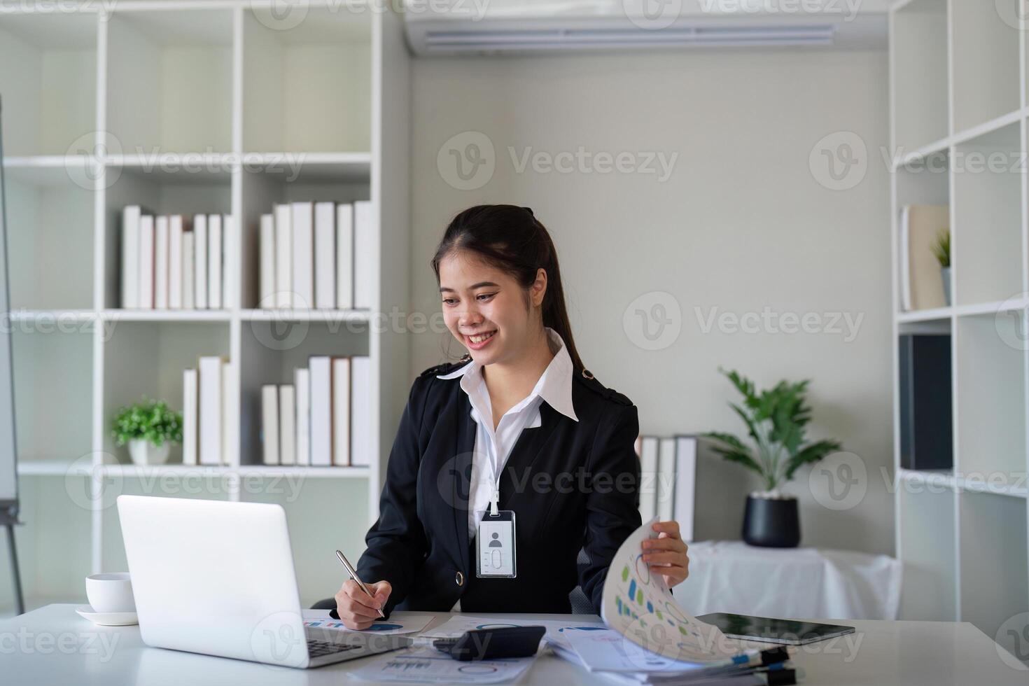 Business accounting woman counting on calculator working on financial document in hands closeup. Bookkeeping concept photo