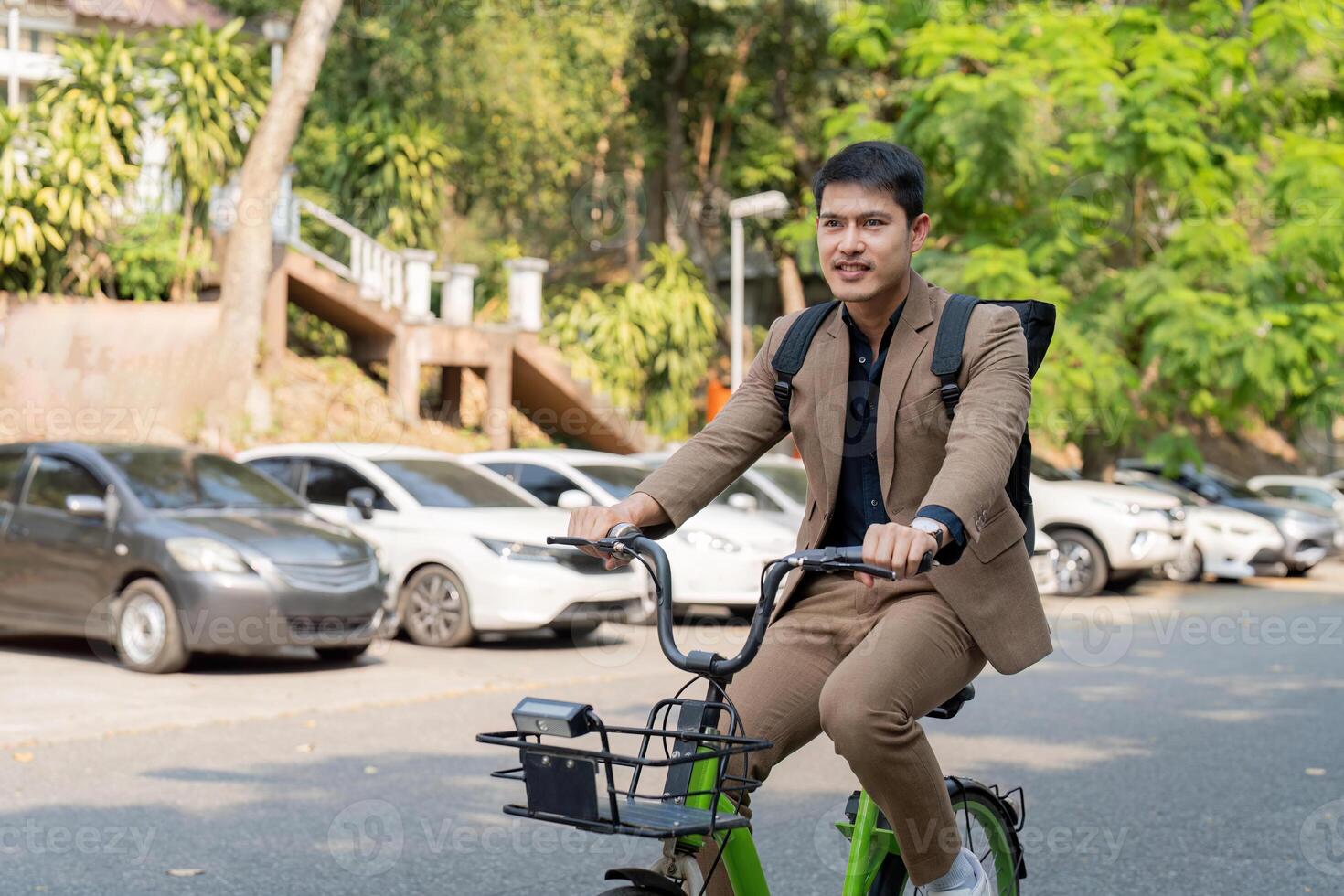 The businessman eco friendly transportation, cycling through the city avenues to go to work. sustainable lifestyle concept photo