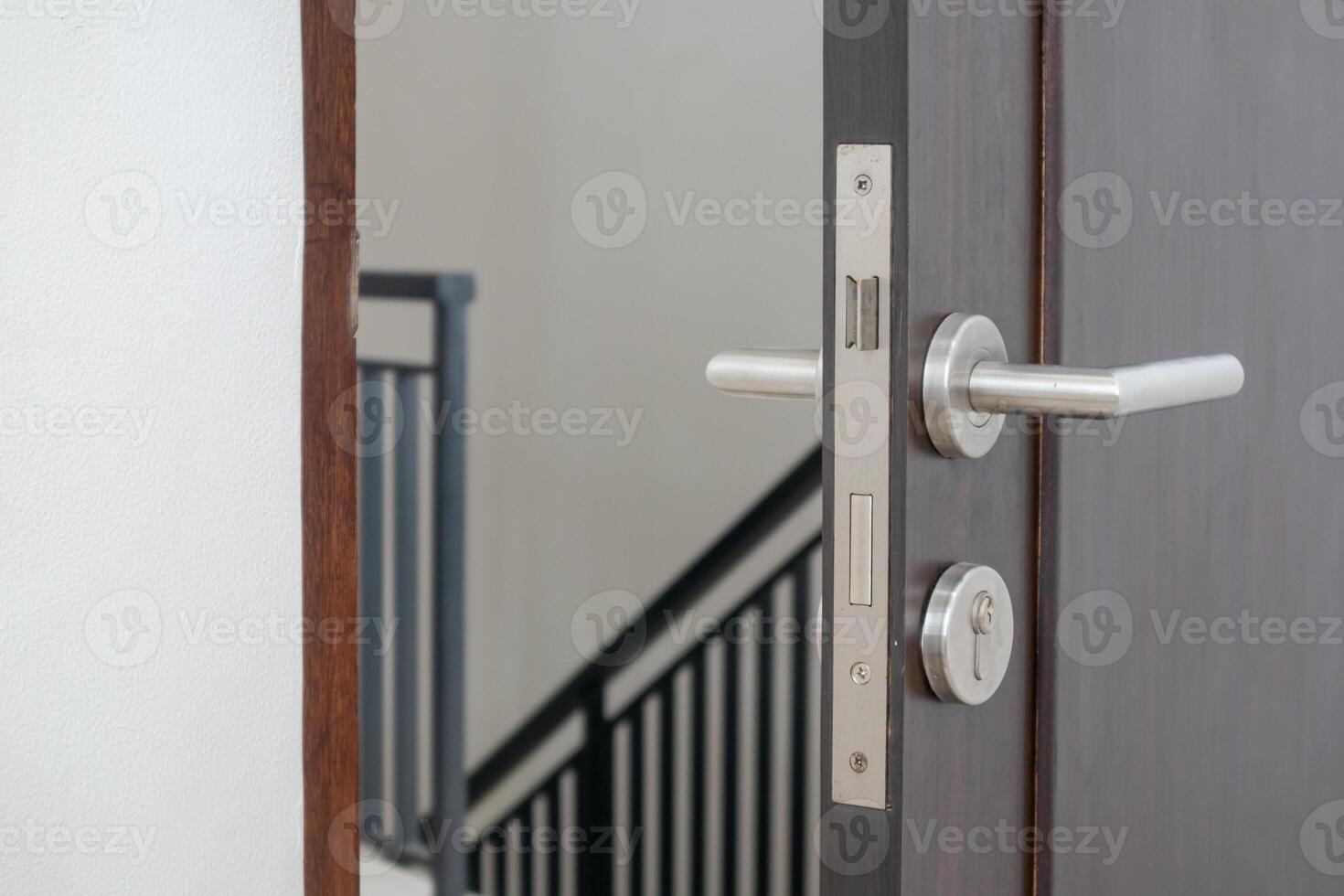 Close up view of the bedroom door opened. Half-open door of a bedroom. photo