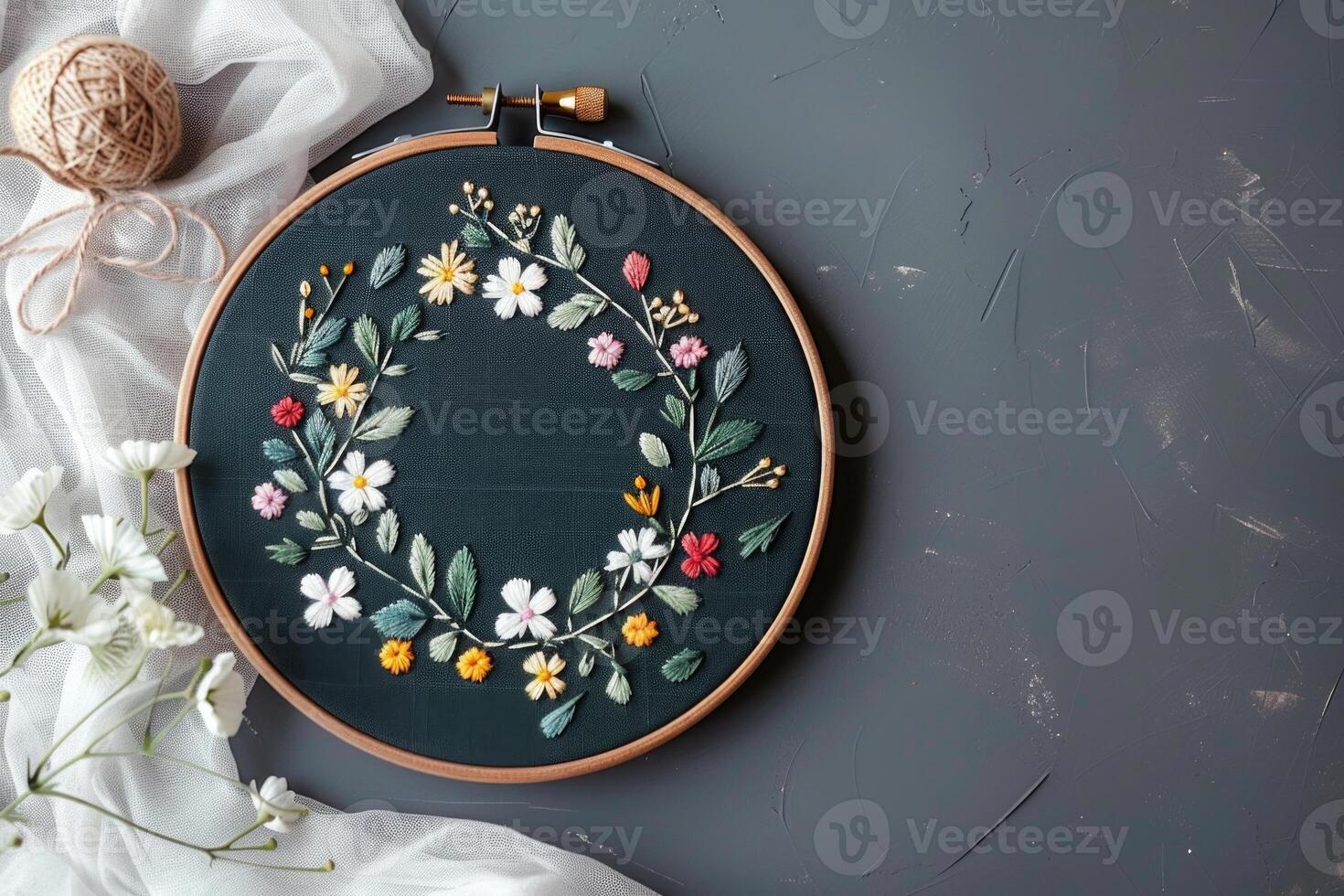 AI generated Hoop with embroidered wildflowers. Embroidery of flowers on a dark background with copy space. Handicrafts and hobbies photo