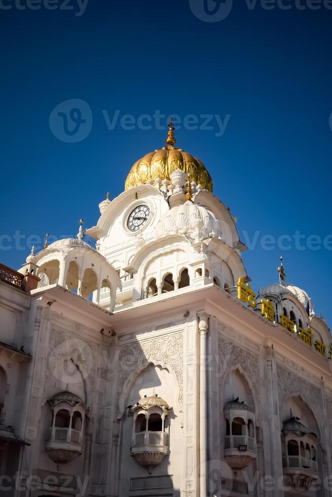 View of details of architecture inside Golden Temple - Harmandir Sahib in Amritsar, Punjab, India, Famous indian sikh landmark, Golden Temple, the main sanctuary of Sikhs in Amritsar, India photo