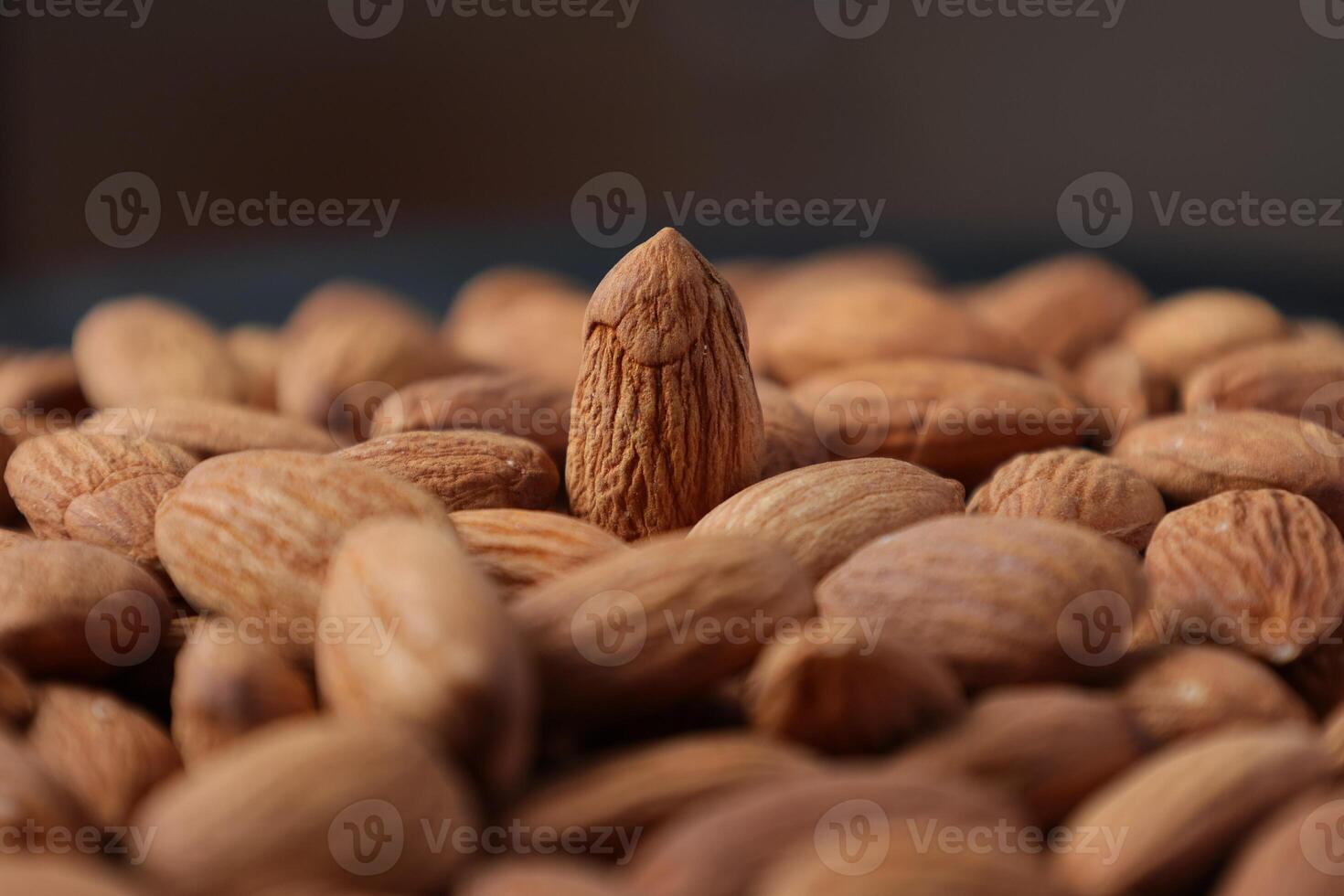 Closeup of almond, nut food, brown almonds photo